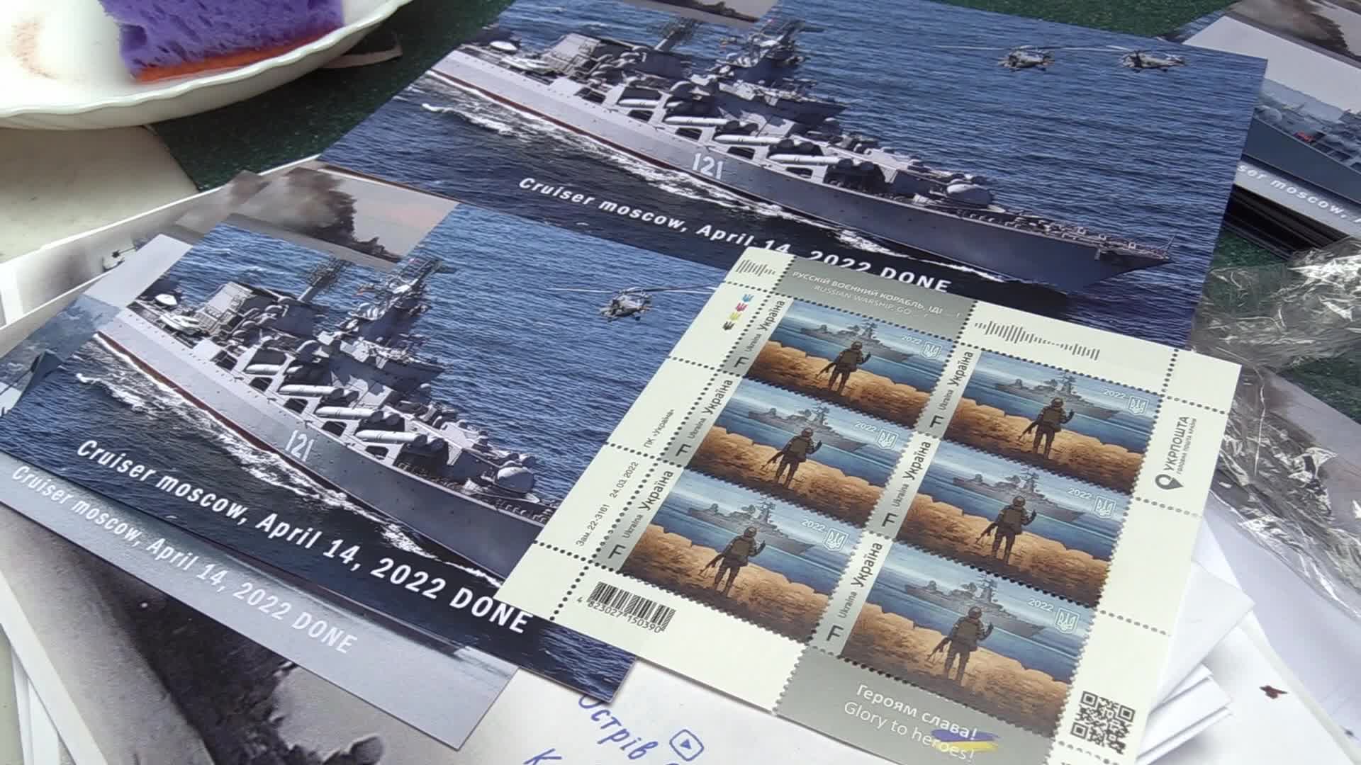 Ukrainians queue to buy a new set of postal service stamps dedicated to the sinking of Russian warship, in Odesa