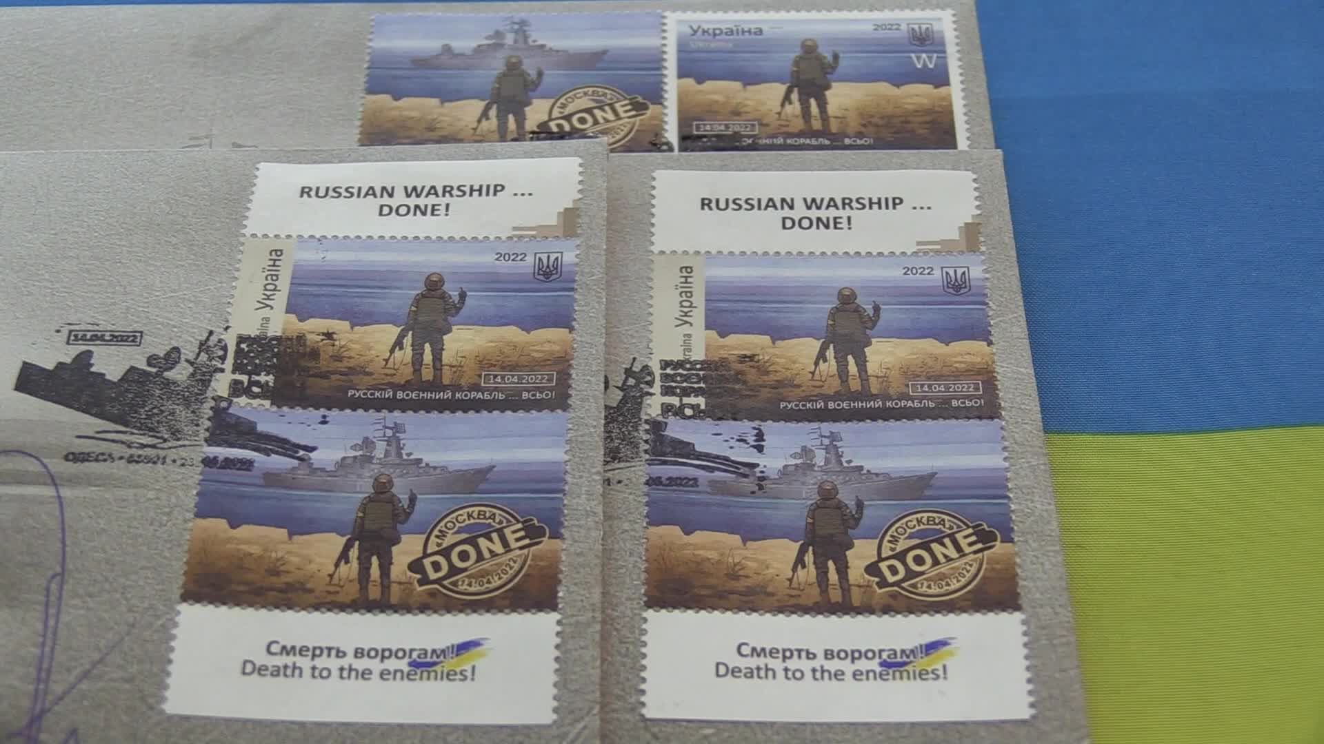 Ukrainians queue to buy a new set of postal service stamps dedicated to the sinking of Russian warship, in Odesa