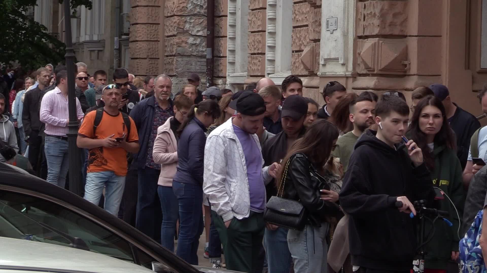 Ukrainians queue to buy a new set of postal service stamps dedicated to the sinking of Russian warship, in Odesa