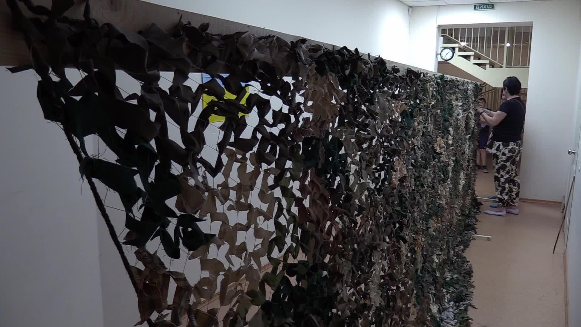 Women weave camouflage nets for Ukrainian armed forces in Odesa, amid Russian invasion in Ukraine