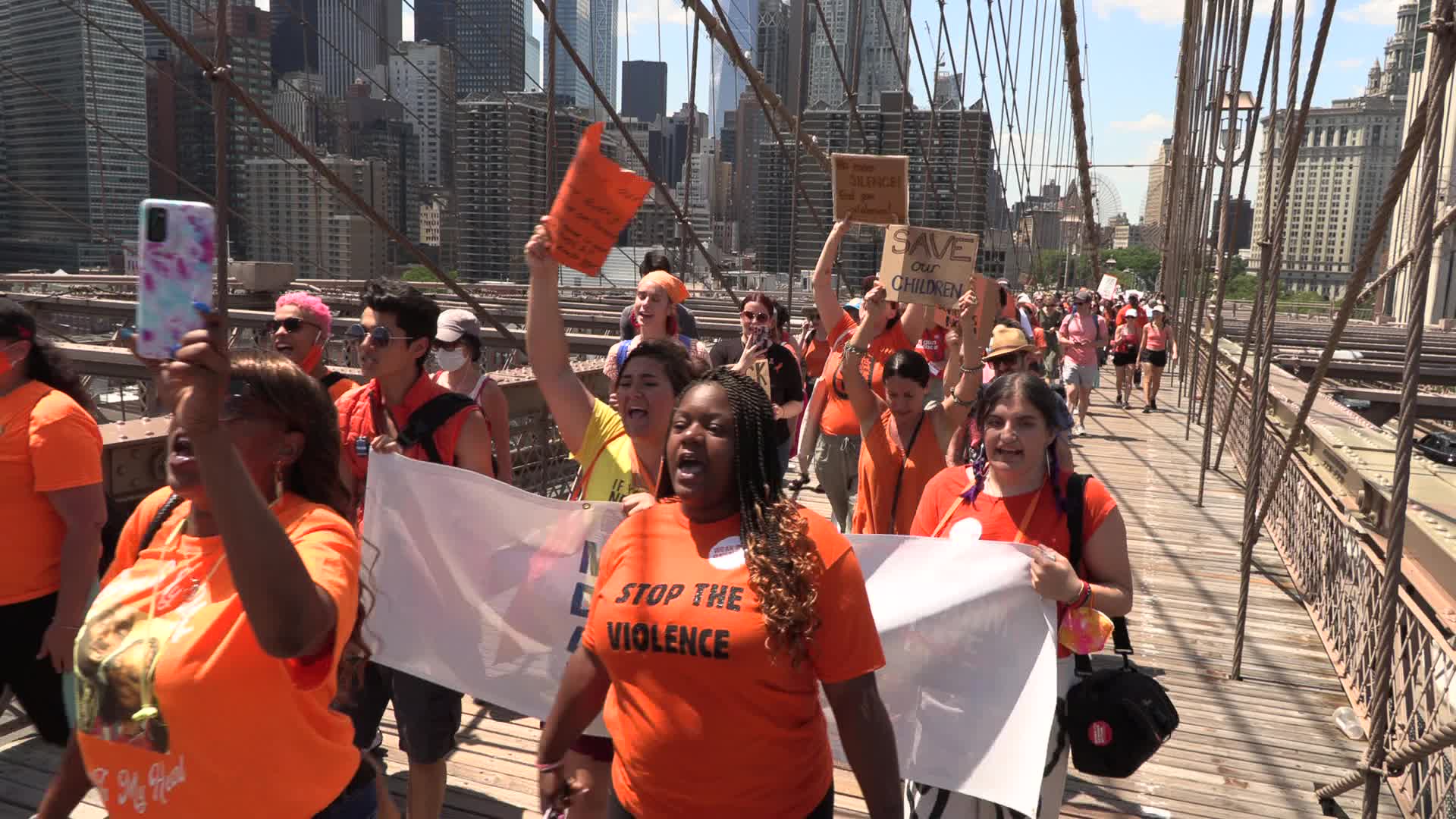 NYC: Moms march over Brooklyn Bridge against gun violence