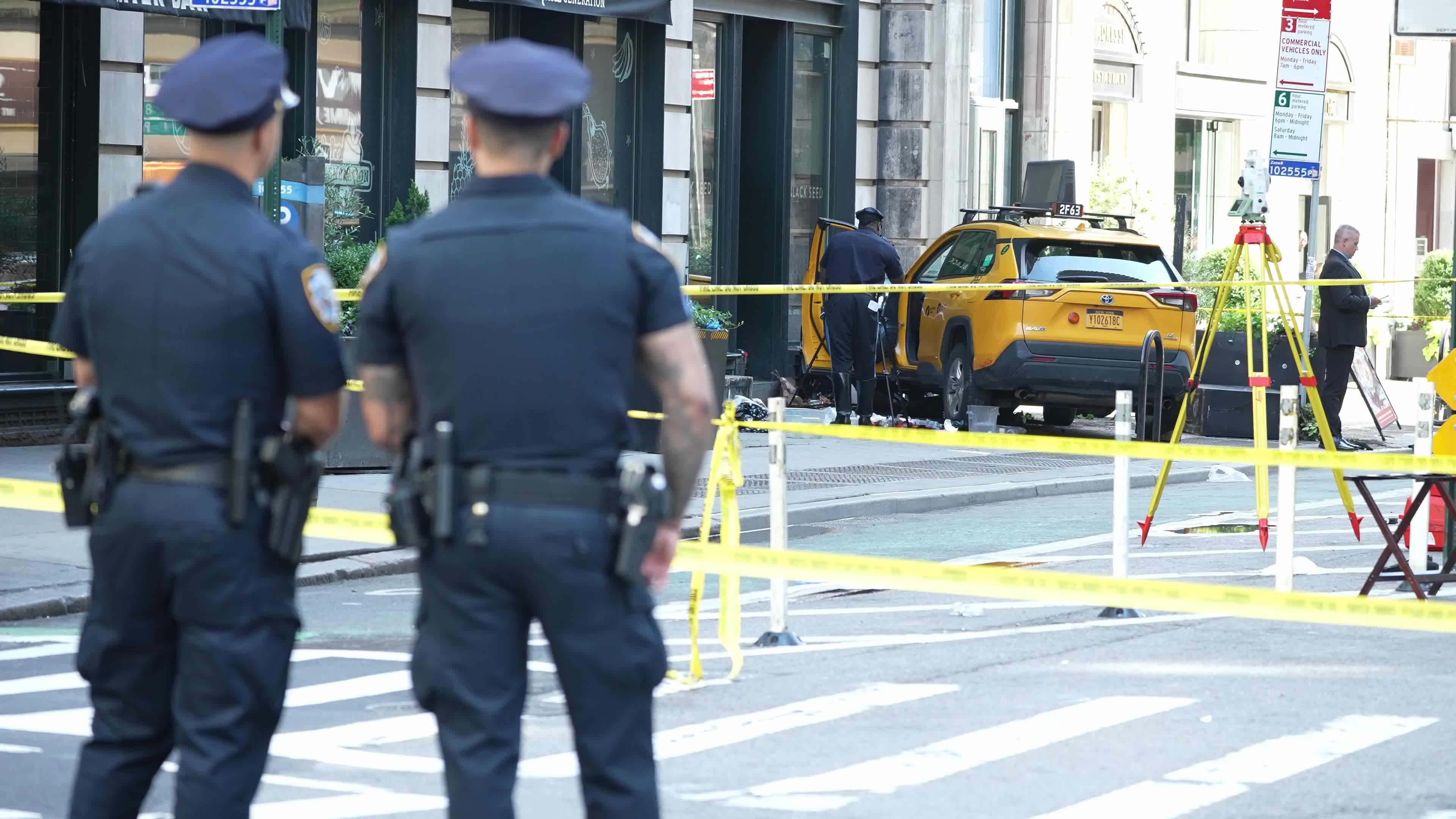 6 people hospitalized after taxi jumps curb in New York City, NYPD says