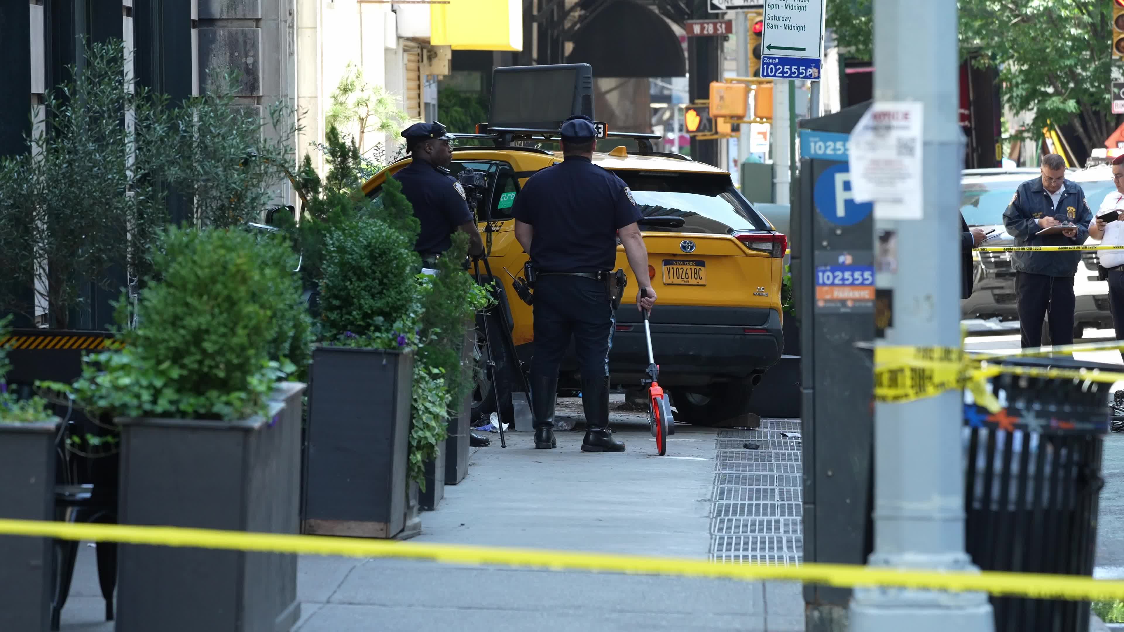 6 people hospitalized after taxi jumps curb in New York City, NYPD says