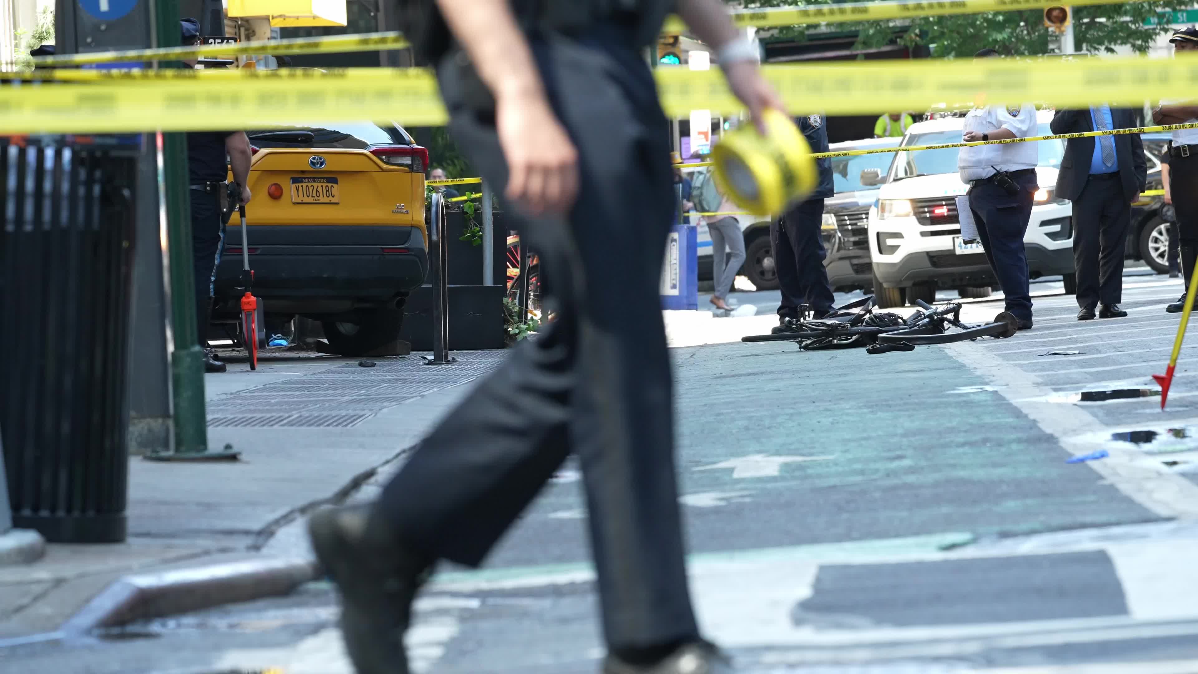 6 people hospitalized after taxi jumps curb in New York City, NYPD says