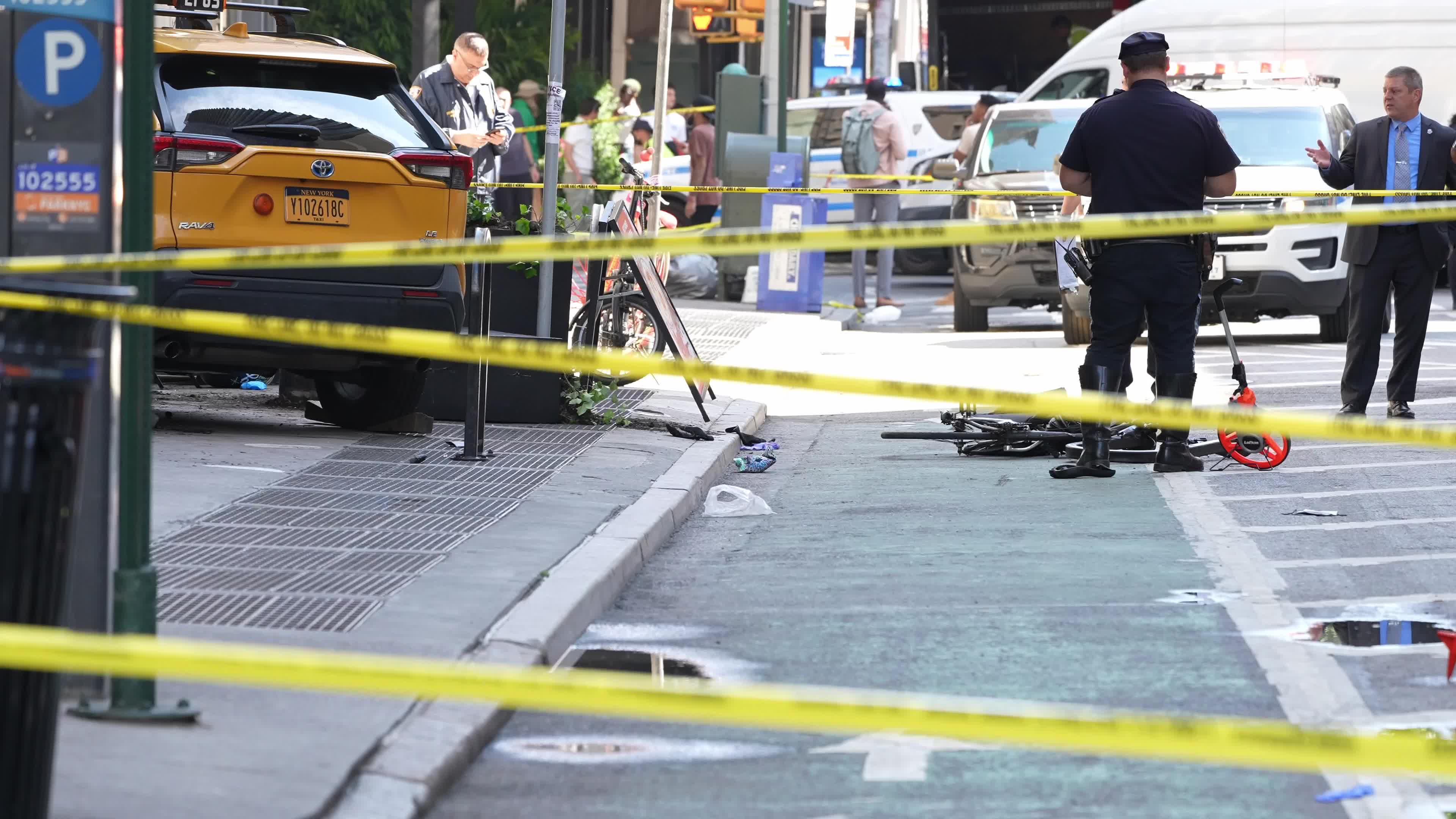 6 people hospitalized after taxi jumps curb in New York City, NYPD says