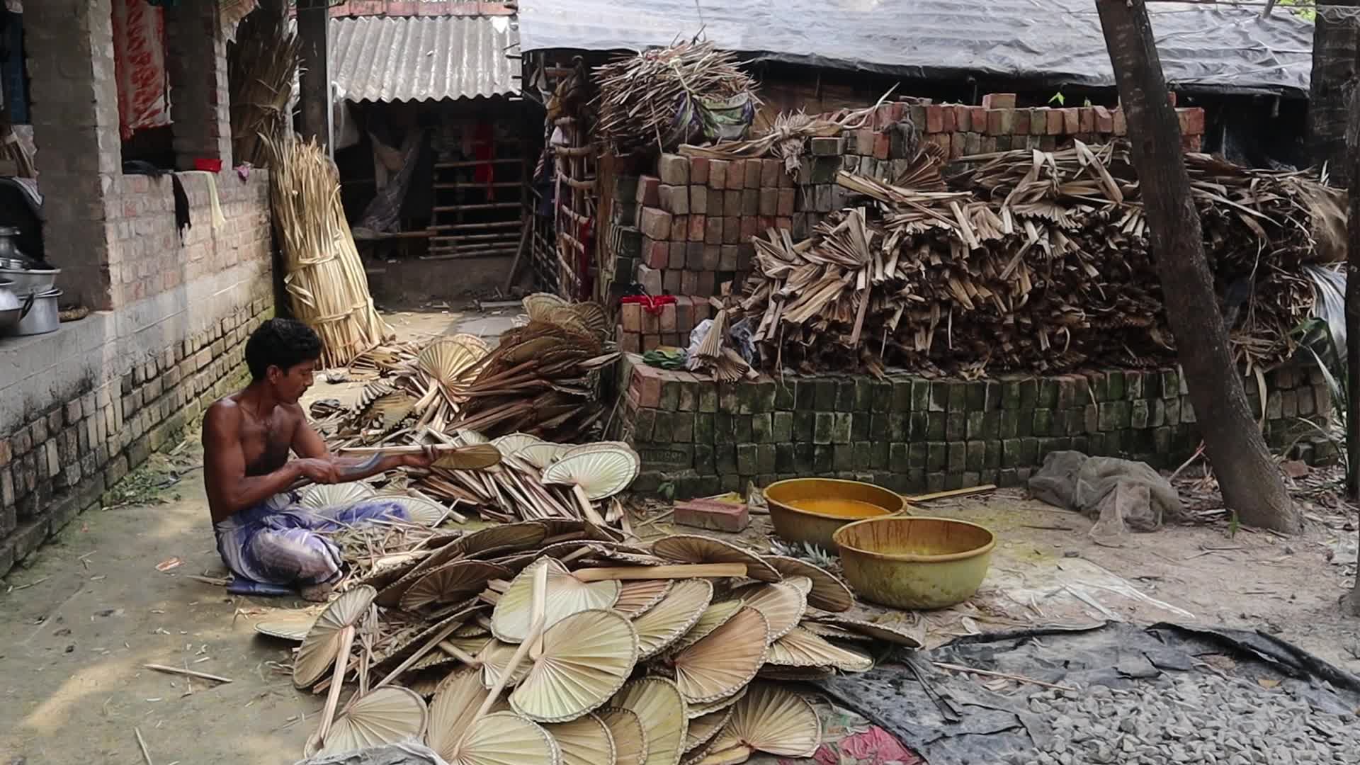 Traditional handmade palm leaf fan makers of West Bengal 