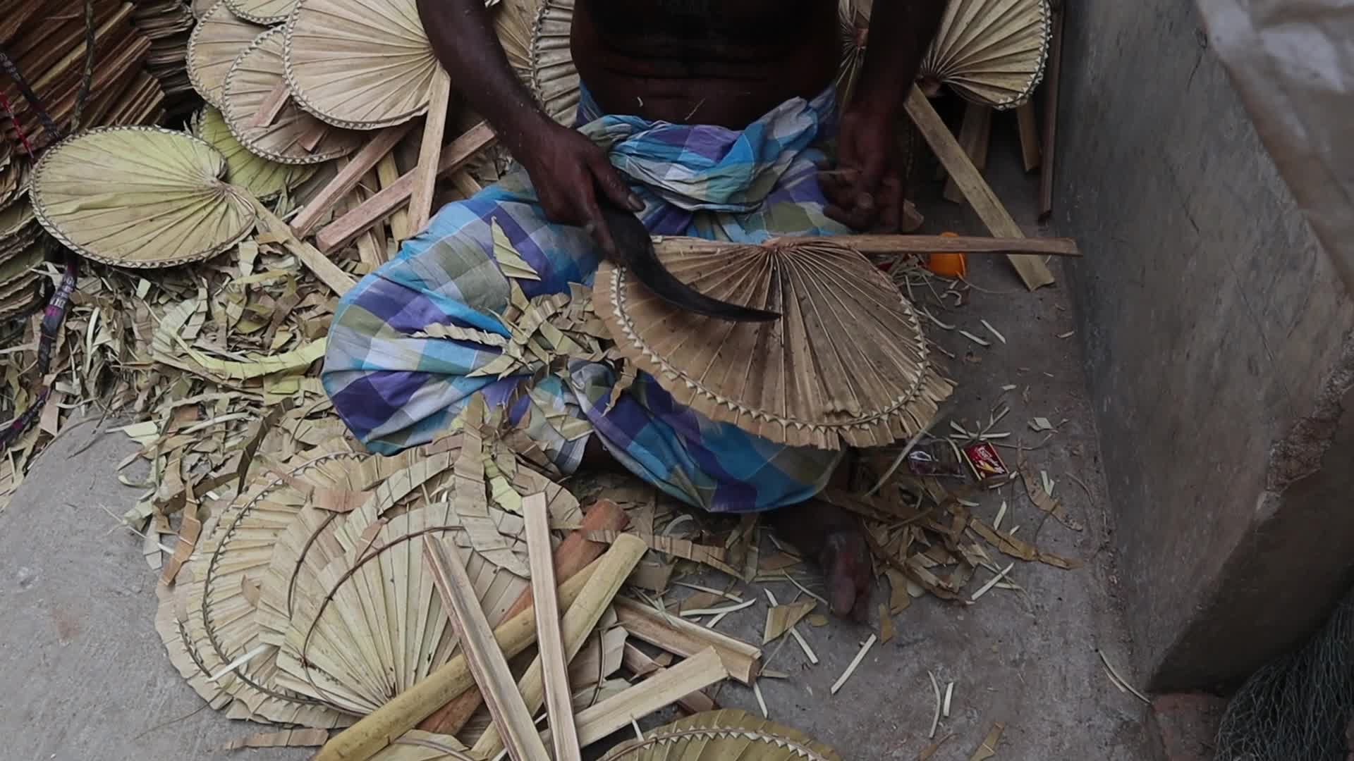 Traditional handmade palm leaf fan makers of West Bengal 