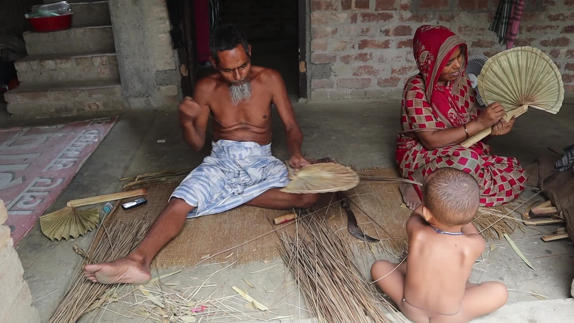 Traditional handmade palm leaf fan makers of West Bengal 
