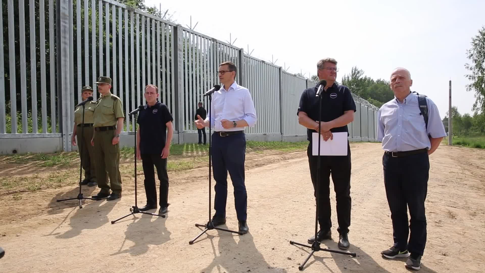 Poland finishes building a border barrier with Belarus