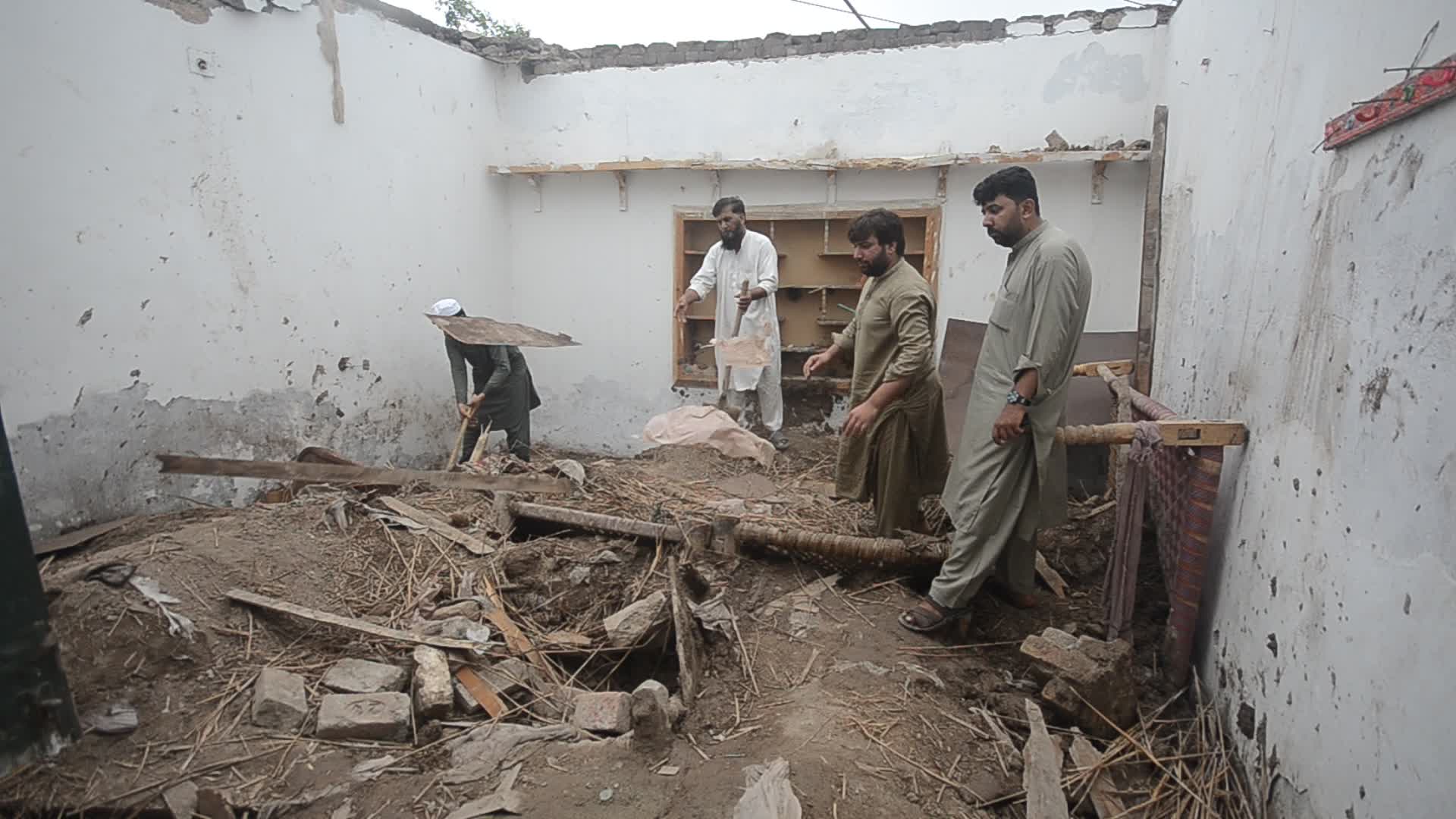 Roof of mud house collapsed killing one and two woman injured in Peshawar
