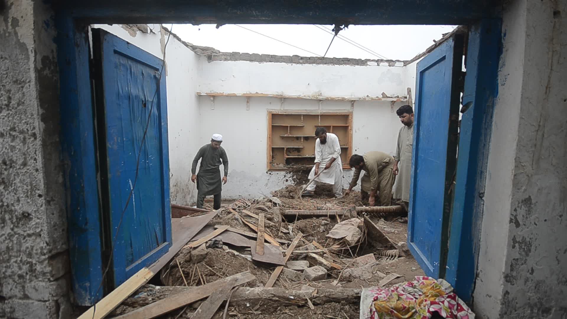 Roof of mud house collapsed killing one and two woman injured in Peshawar
