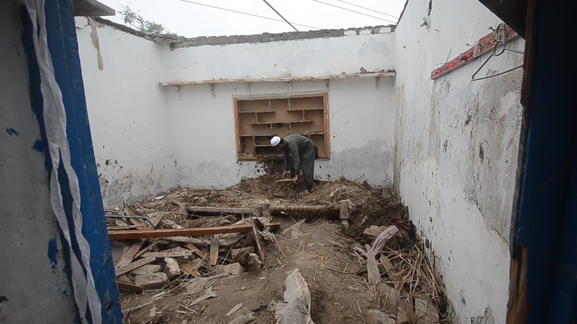 Roof of mud house collapsed killing one and two woman injured in Peshawar
