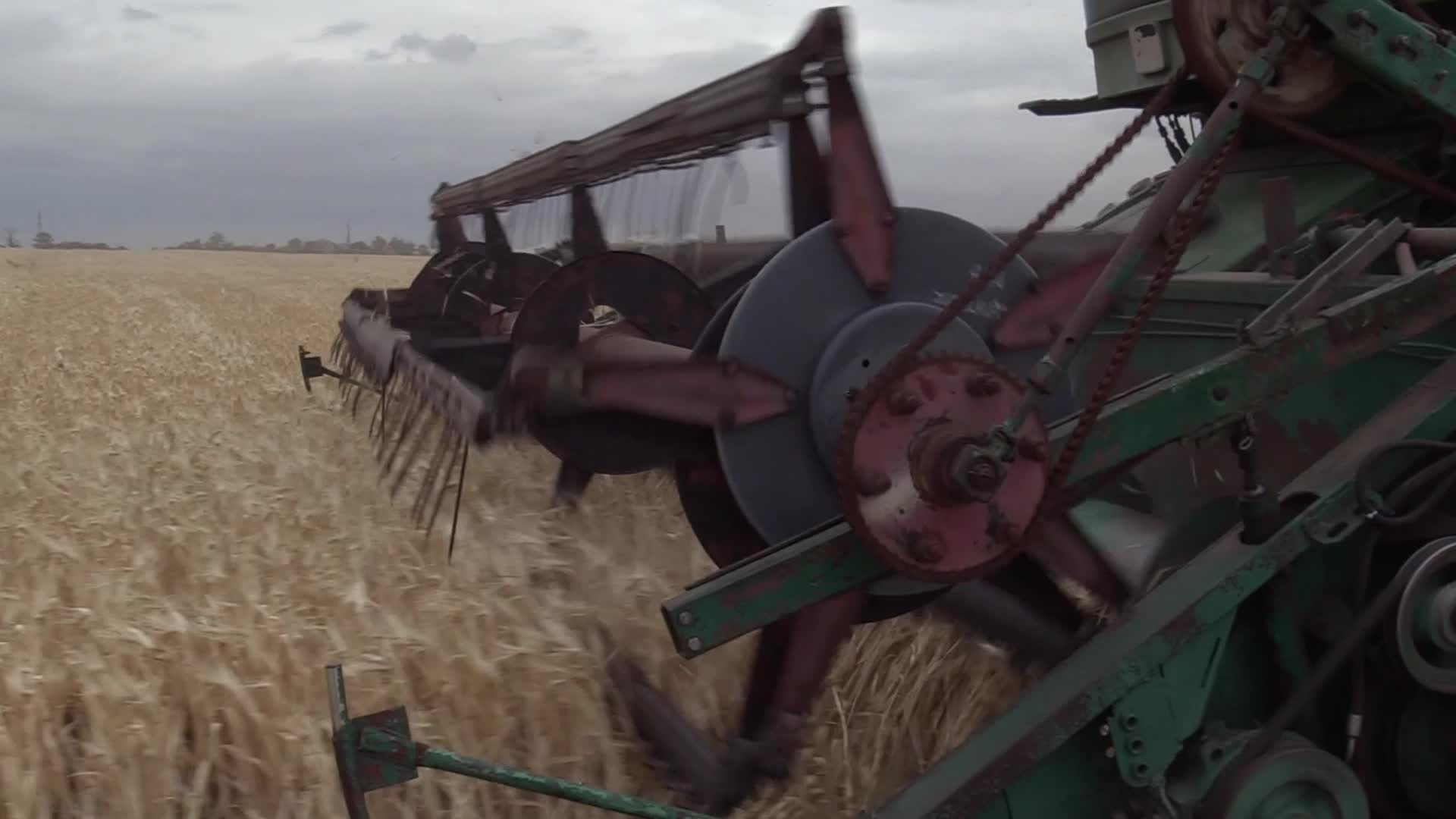 Ukrainian farmers harvesting grain of winter barley in Odesa region, amid Russia's invasion of Ukraine
