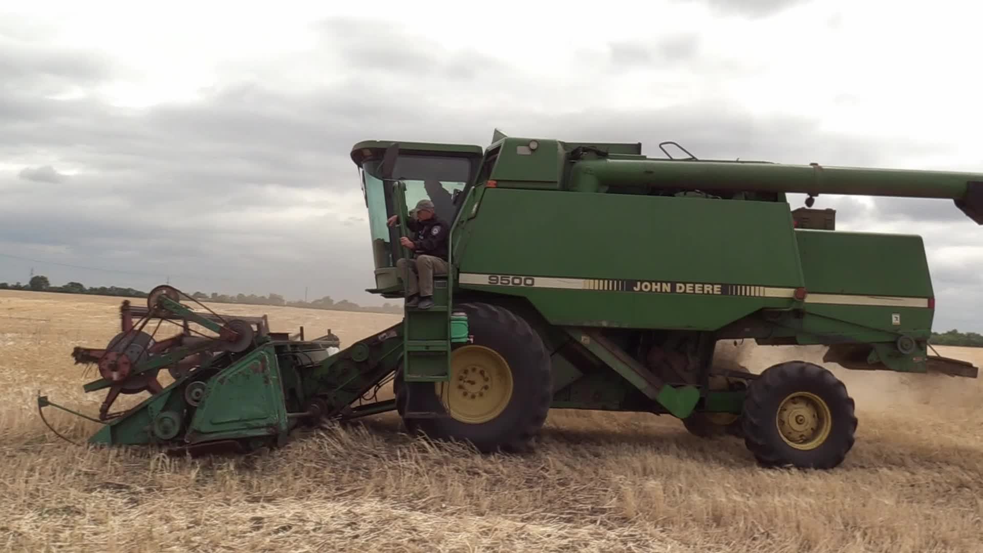 Ukrainian farmers harvesting grain of winter barley in Odesa region, amid Russia's invasion of Ukraine