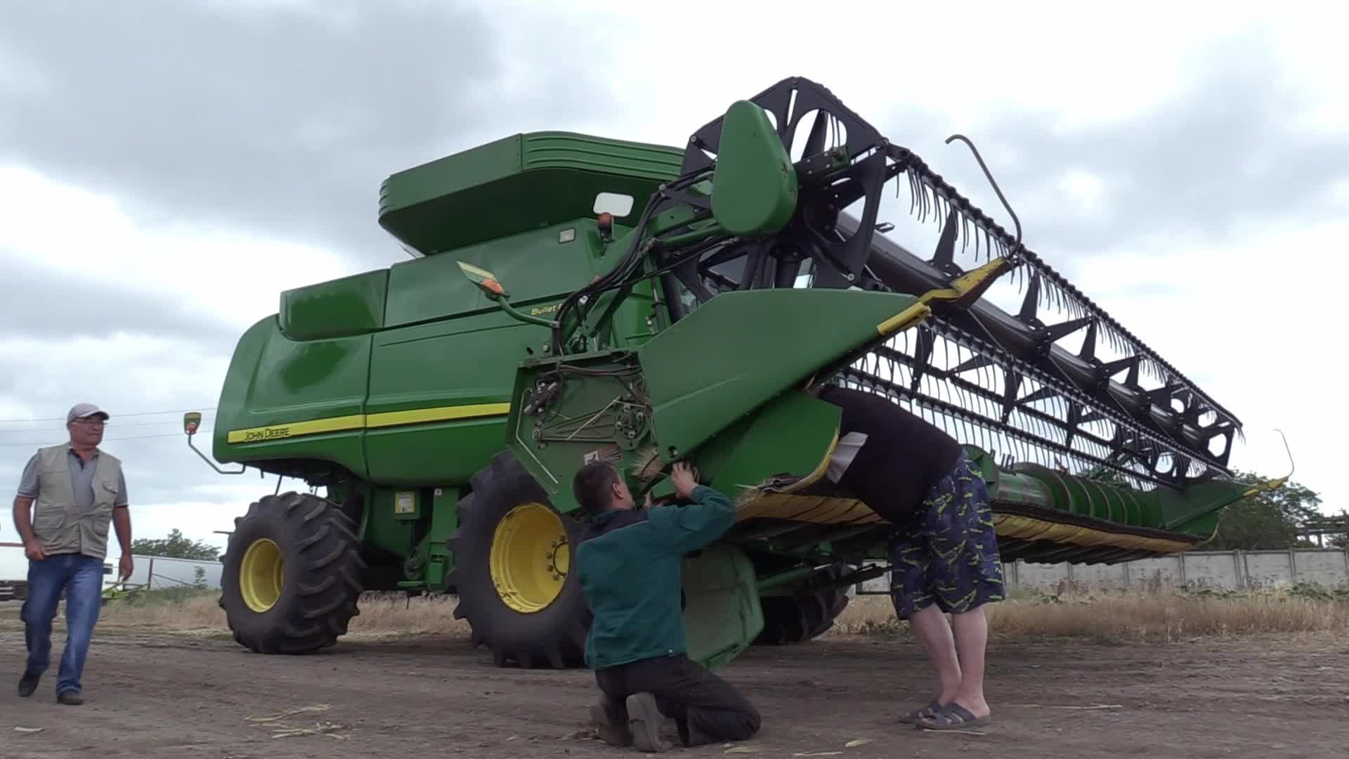 Ukrainian farmers harvesting grain of winter barley in Odesa region, amid Russia's invasion of Ukraine