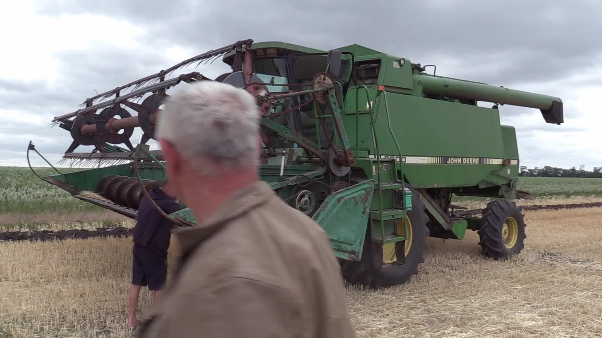 Ukrainian farmers harvesting grain of winter barley in Odesa region, amid Russia's invasion of Ukraine