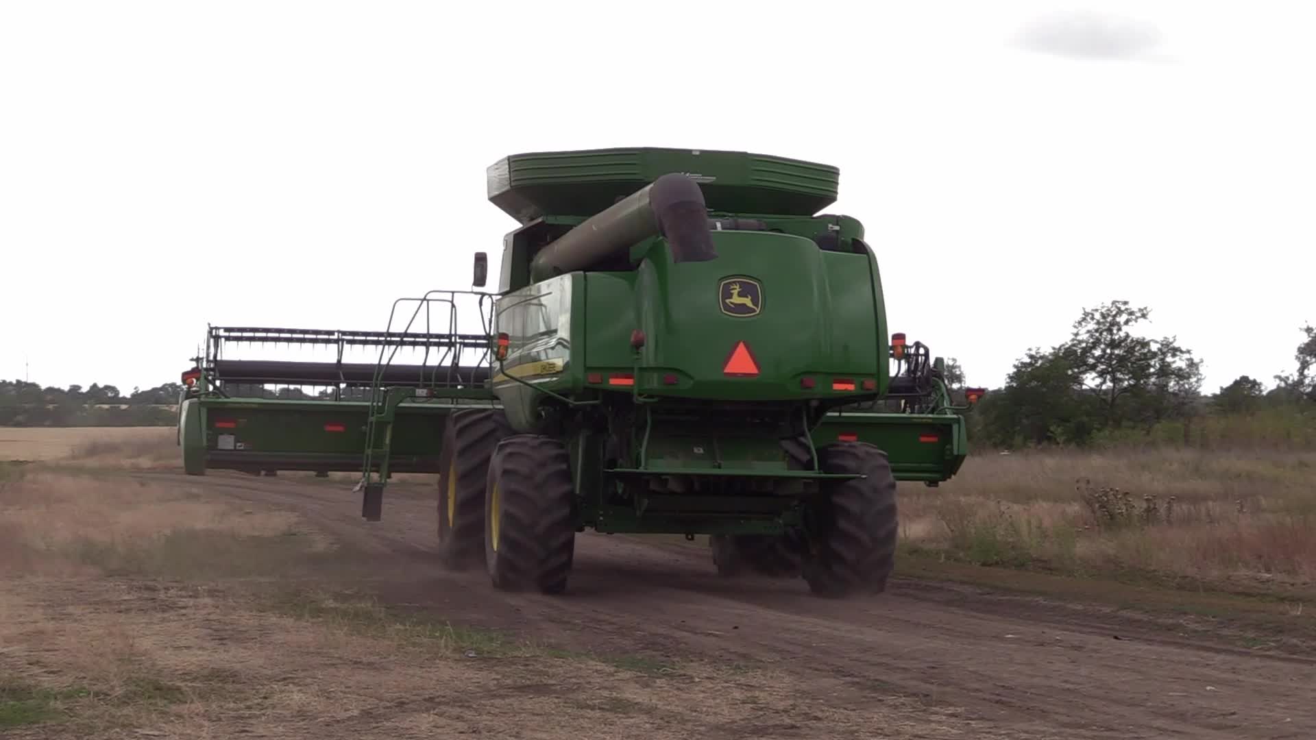 Ukrainian farmers harvesting grain of winter barley in Odesa region, amid Russia's invasion of Ukraine
