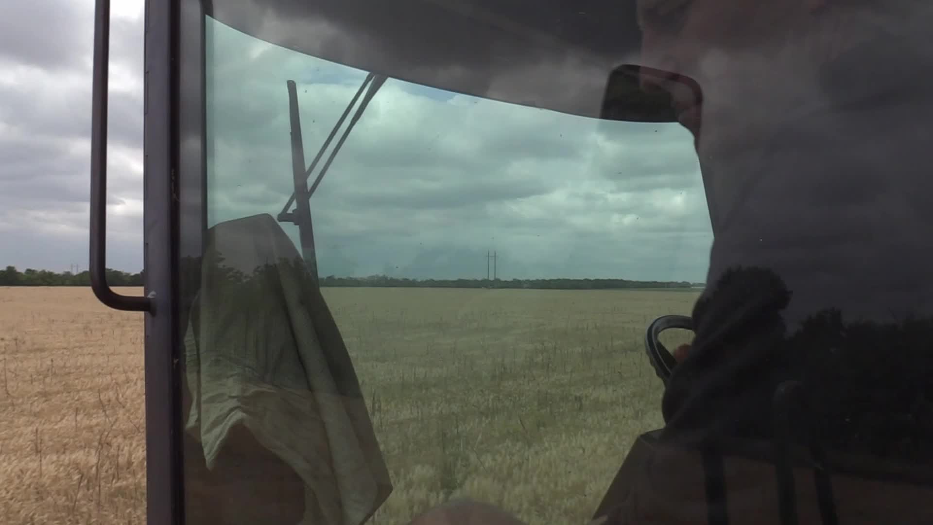 Ukrainian farmers harvesting grain of winter barley in Odesa region, amid Russia's invasion of Ukraine