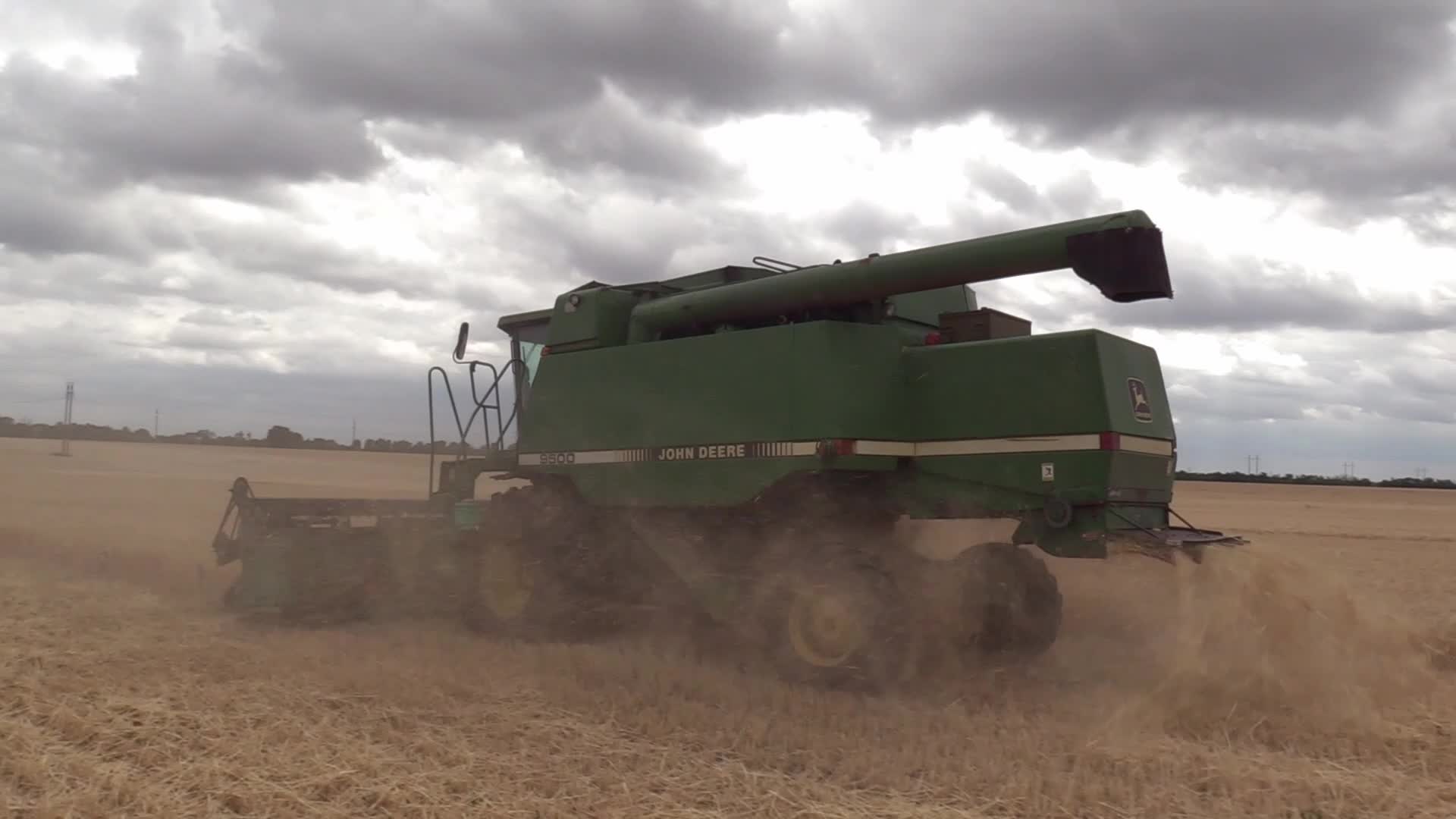 Ukrainian farmers harvesting grain of winter barley in Odesa region, amid Russia's invasion of Ukraine