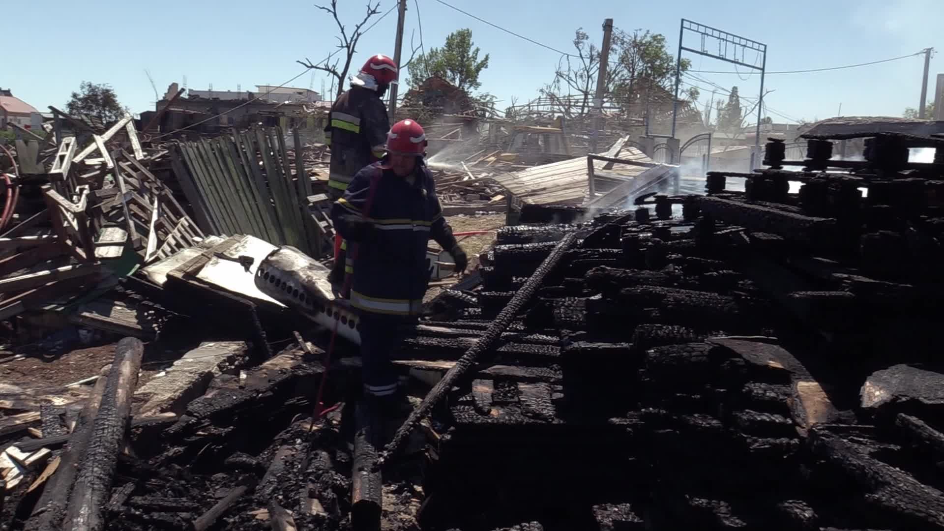 Ukrainian rescuers work at a site of a rocket strike in Odesa region, amid Russia's invasion of Ukraine