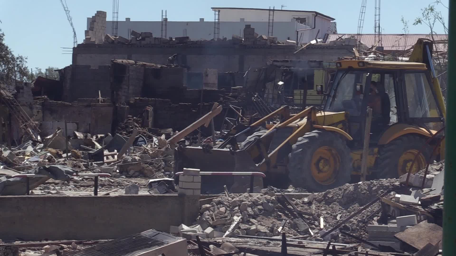 Ukrainian rescuers work at a site of a rocket strike in Odesa region, amid Russia's invasion of Ukraine