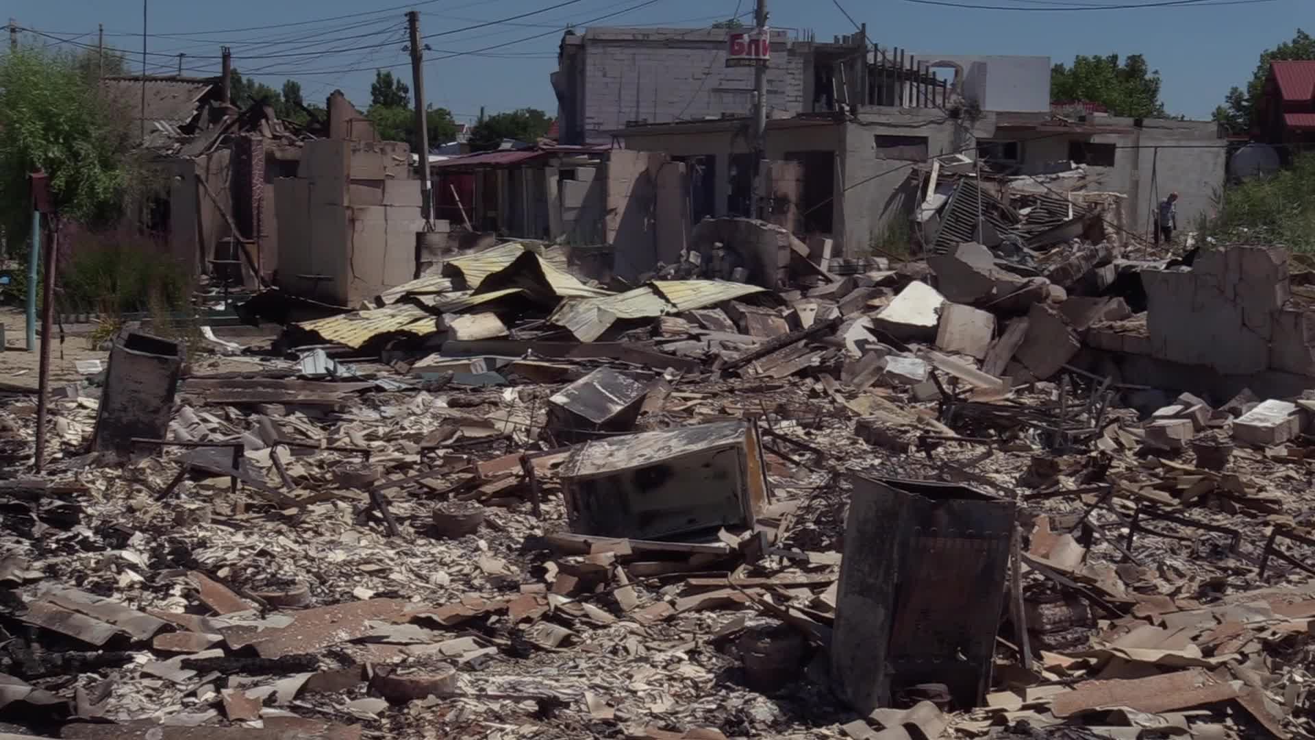 Ukrainian rescuers work at a site of a rocket strike in Odesa region, amid Russia's invasion of Ukraine
