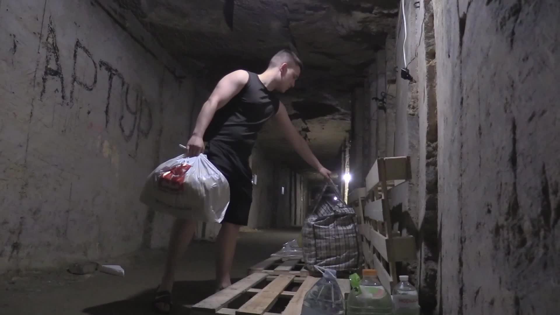 Ukrainians use catacombs as a bomb shelter during air raid alert in Odesa, amid Russia's invasion of Ukraine