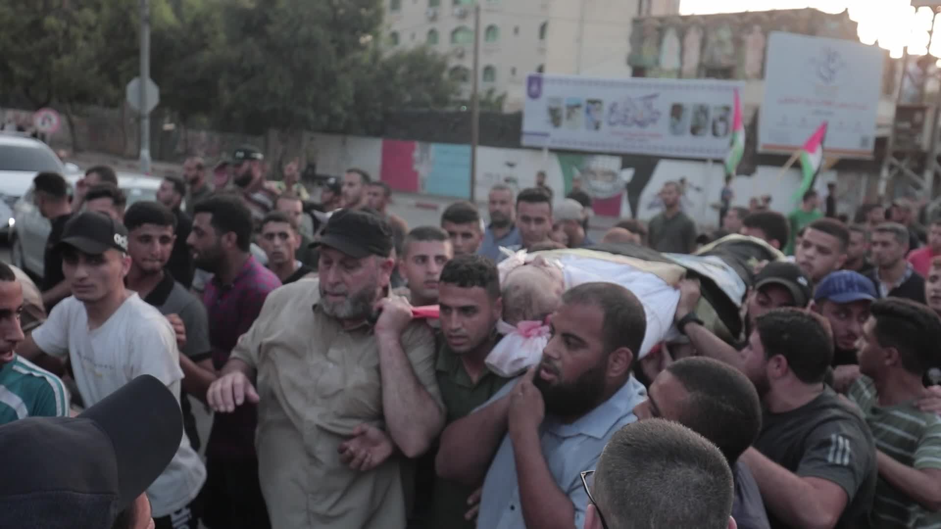 Palestinians attend funeral of Islamic Jihad commander Tayseer al-Jabari, killed in an Israeli air strike