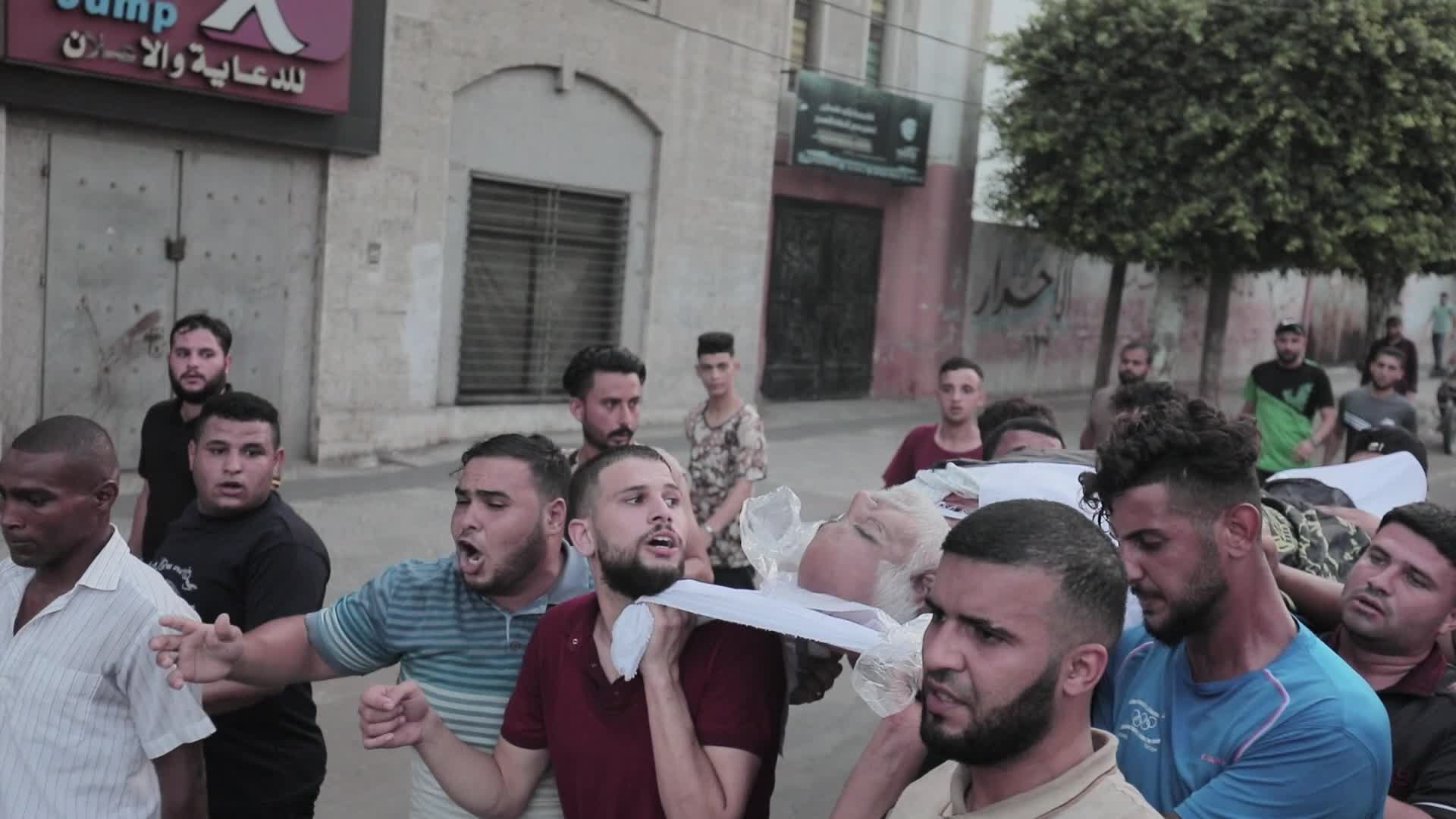 Palestinians attend funeral of Islamic Jihad commander Tayseer al-Jabari, killed in an Israeli air strike