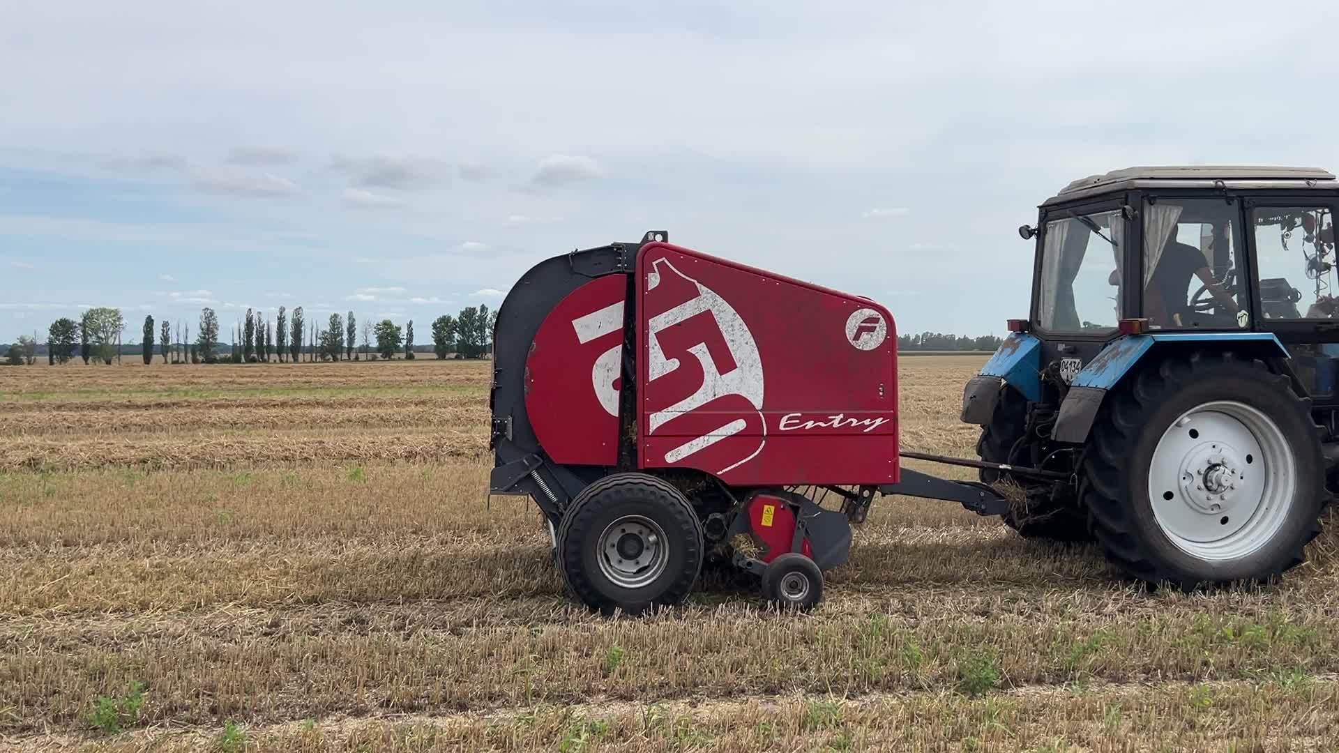 Harvesting Of Wheat In The Kyiv Region, While Russia Continues The War Against Ukraine