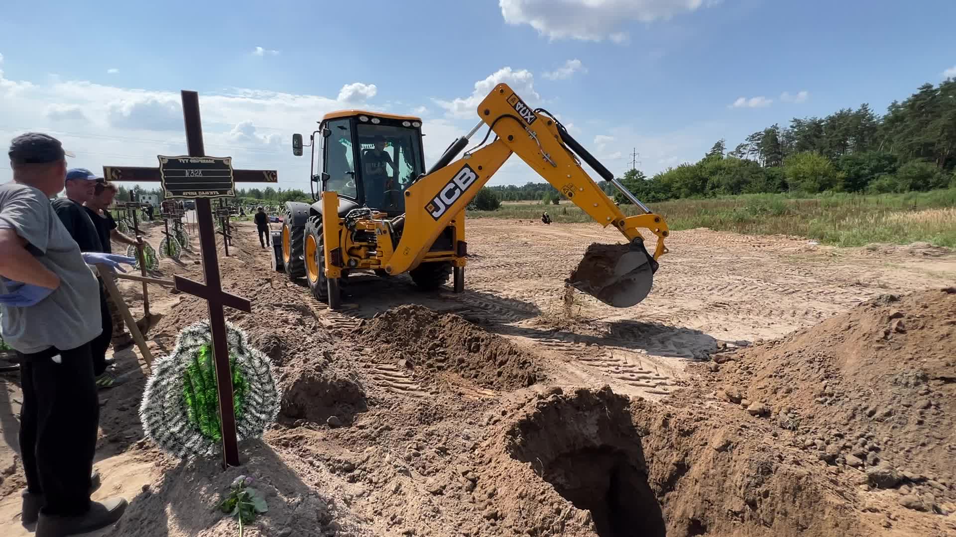 Mass burial of unidentified people killed during Russian invasion in Bucha 