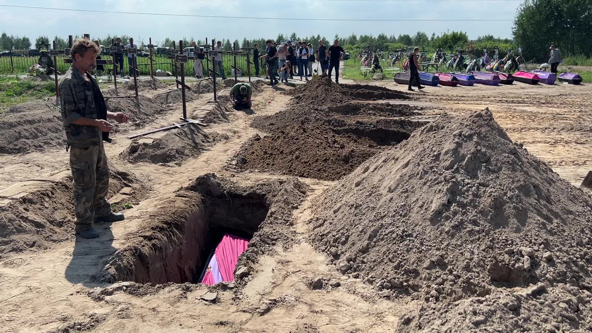 Mass burial of unidentified people killed during Russian invasion in Bucha 