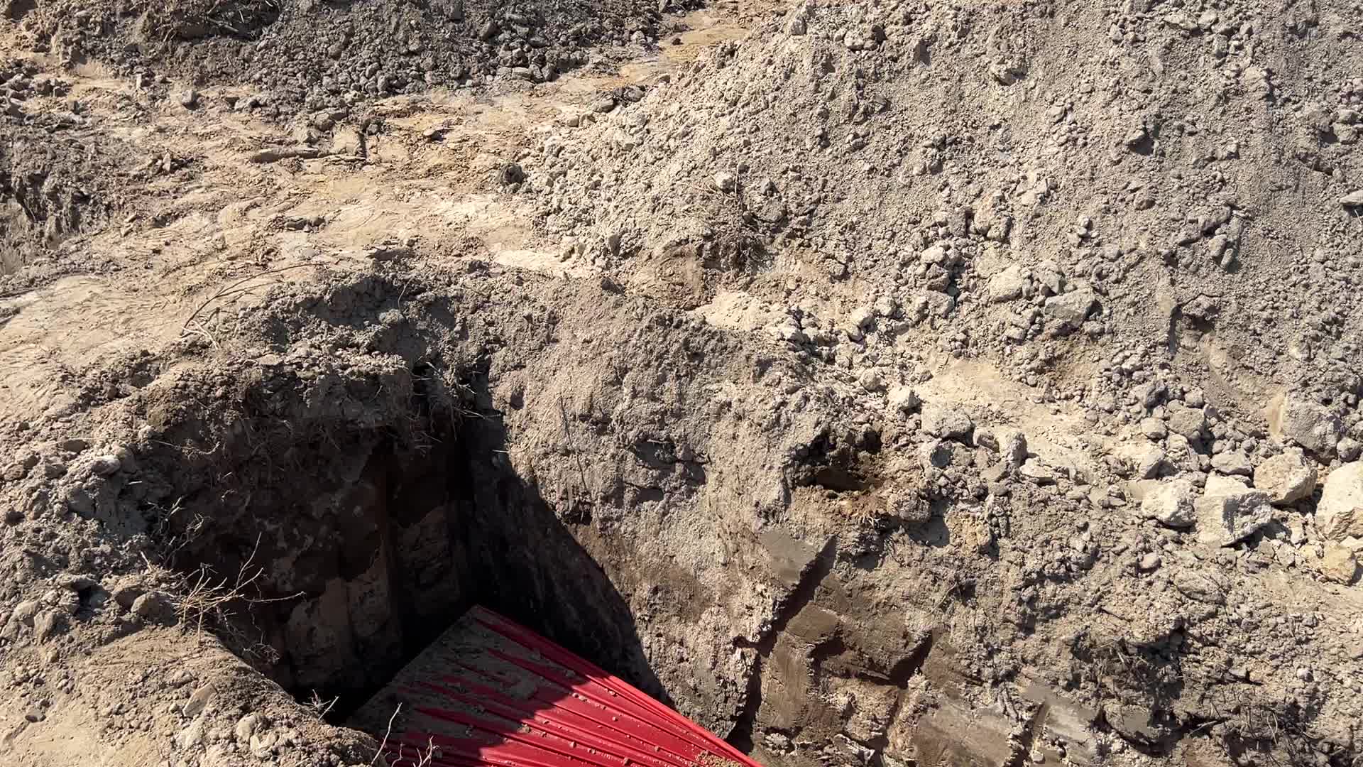 Mass burial of unidentified people killed during Russian invasion in Bucha 