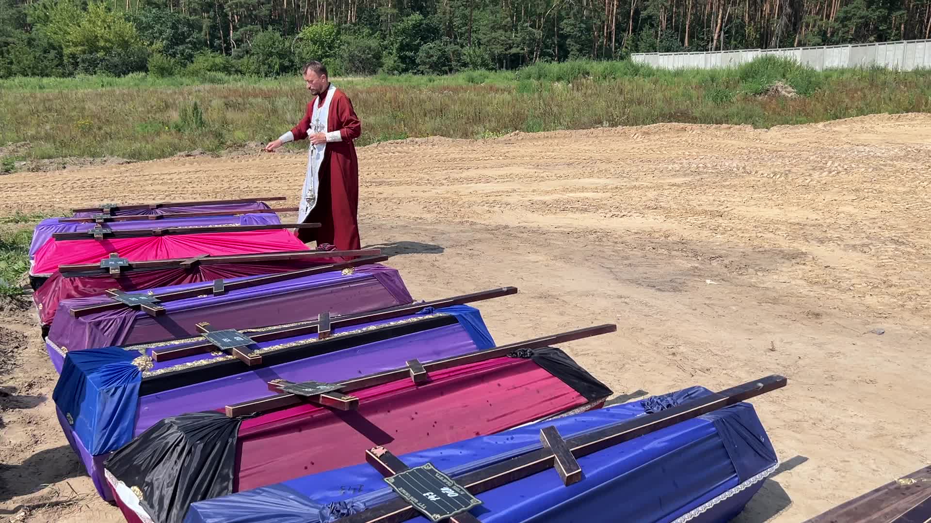 Mass burial of unidentified people killed during Russian invasion in Bucha 