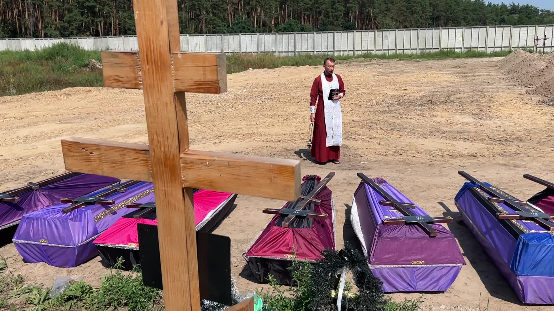 Mass burial of unidentified people killed during Russian invasion in Bucha 