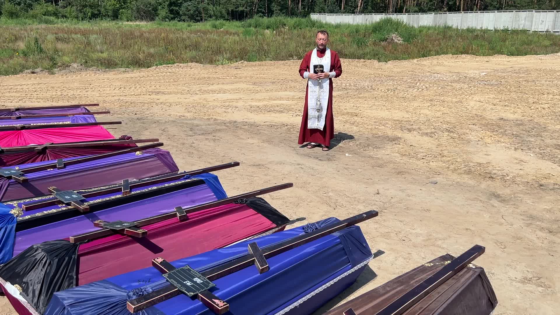 Mass burial of unidentified people killed during Russian invasion in Bucha 