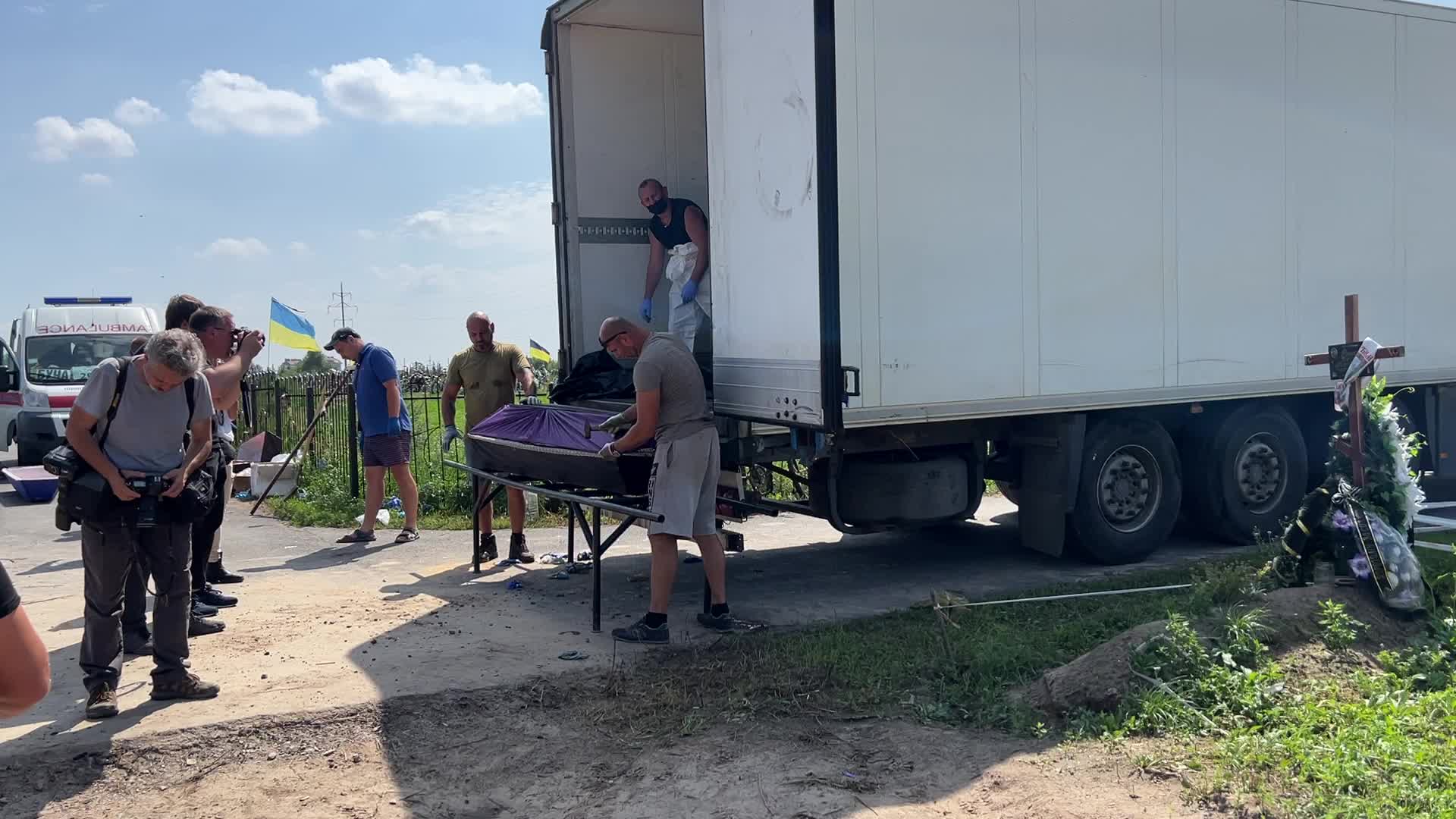 Mass burial of unidentified people killed during Russian invasion in Bucha 