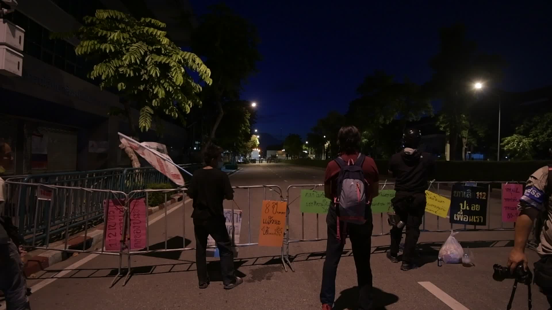 Pro-democracy protesters gather near the Thai Government House in Bangkok