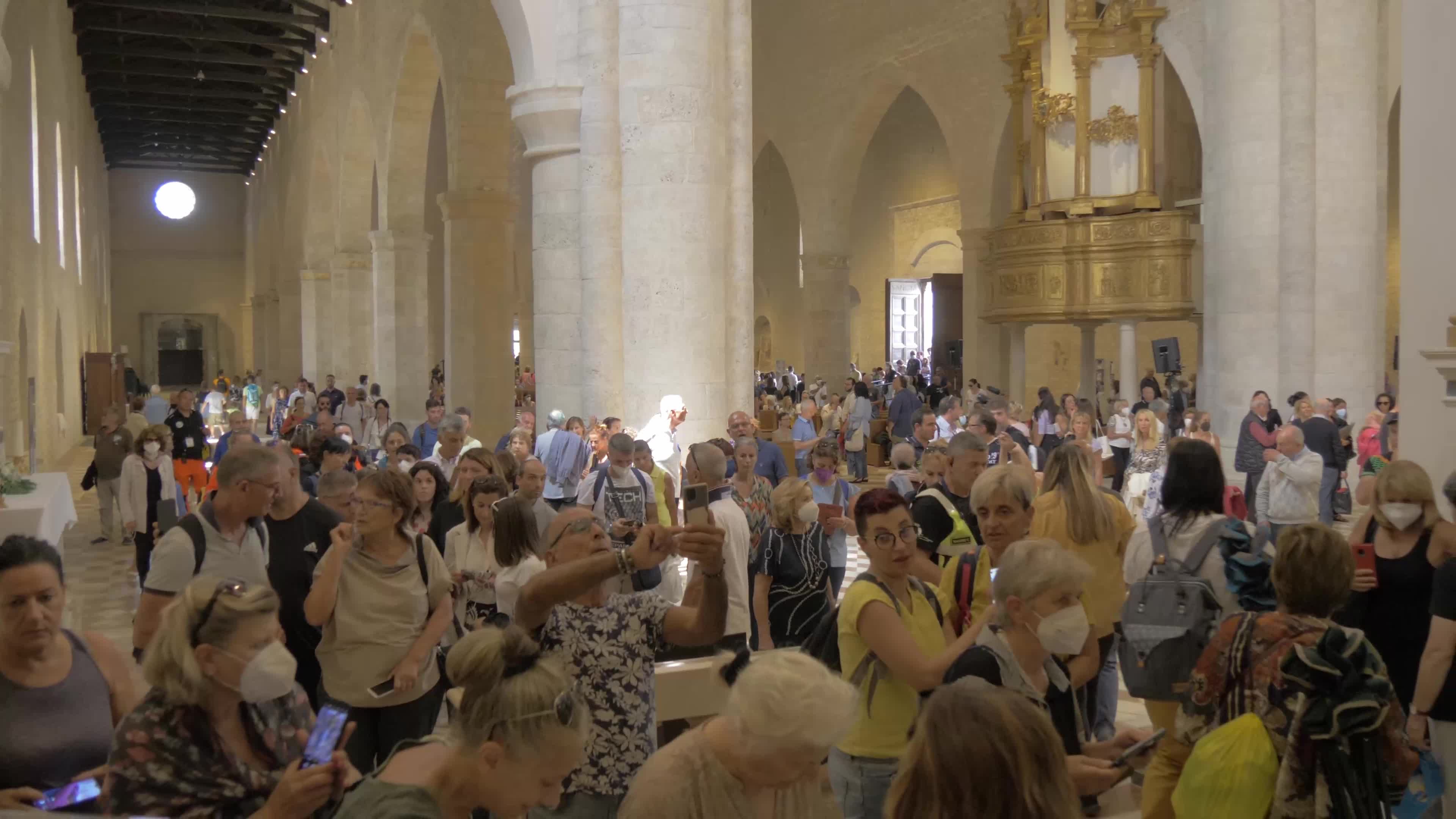 People Enter The Holy Door In L'Aquila, Italy