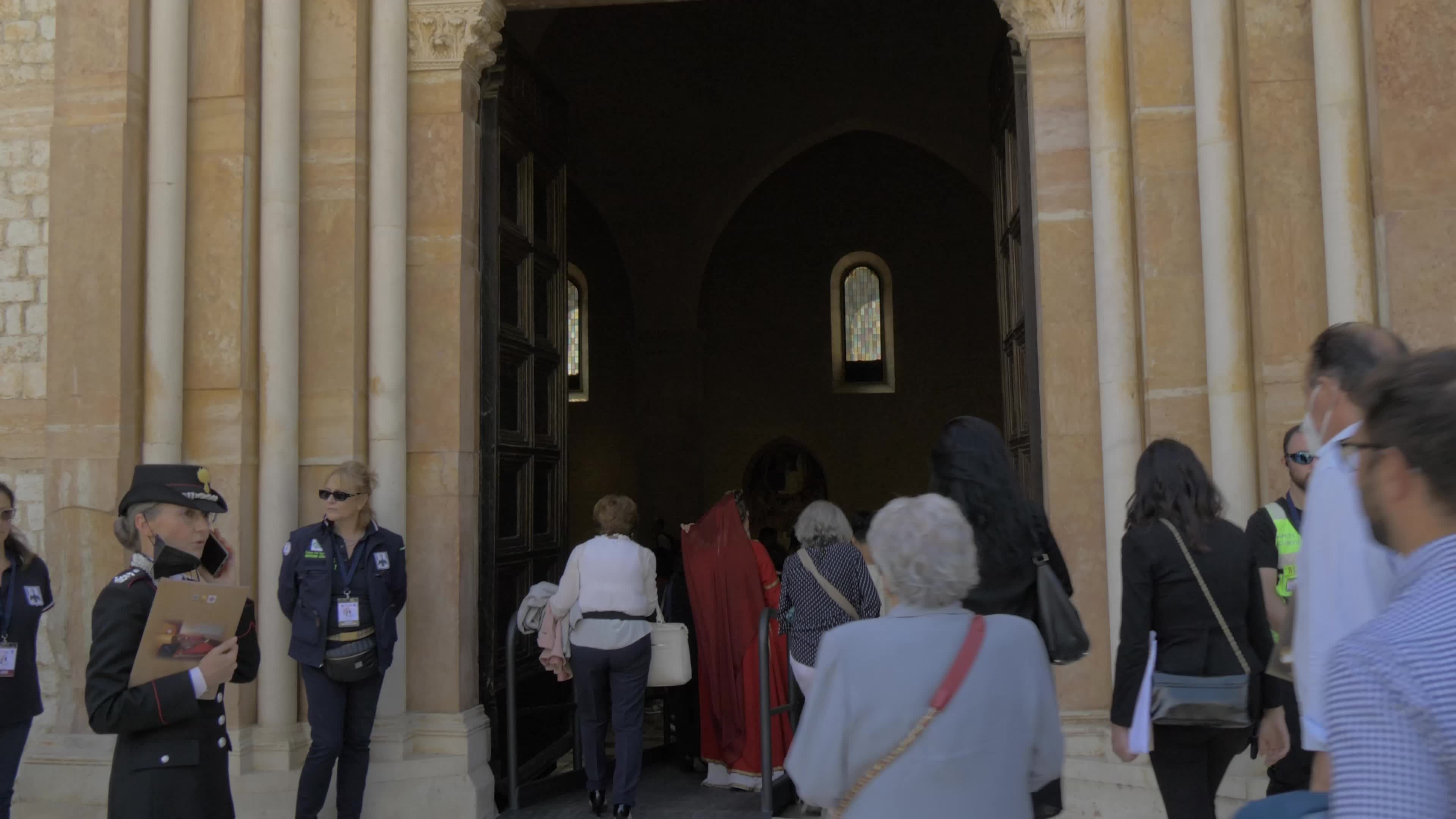 People Enter The Holy Door In L'Aquila, Italy
