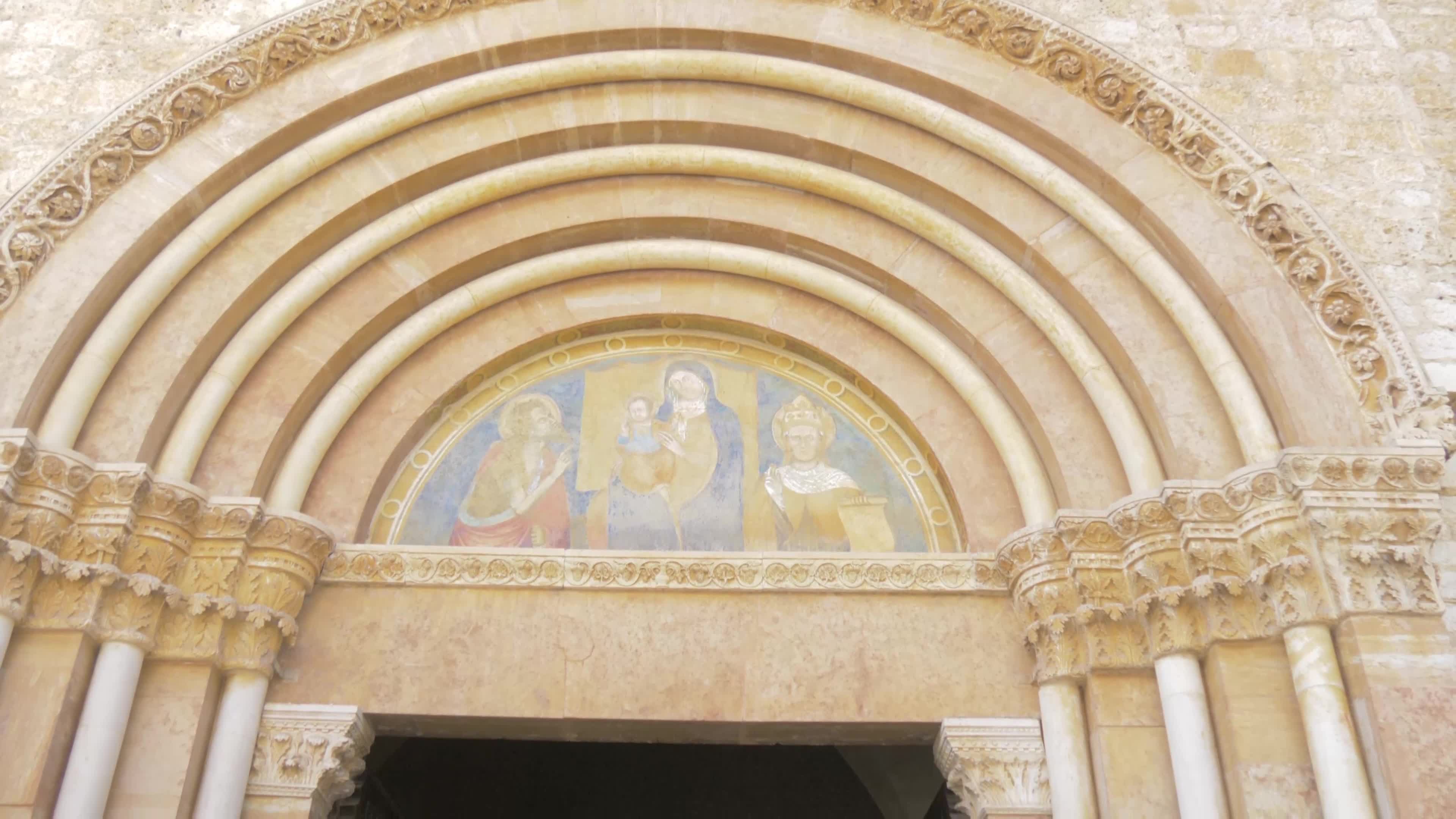 People Enter The Holy Door In L'Aquila, Italy