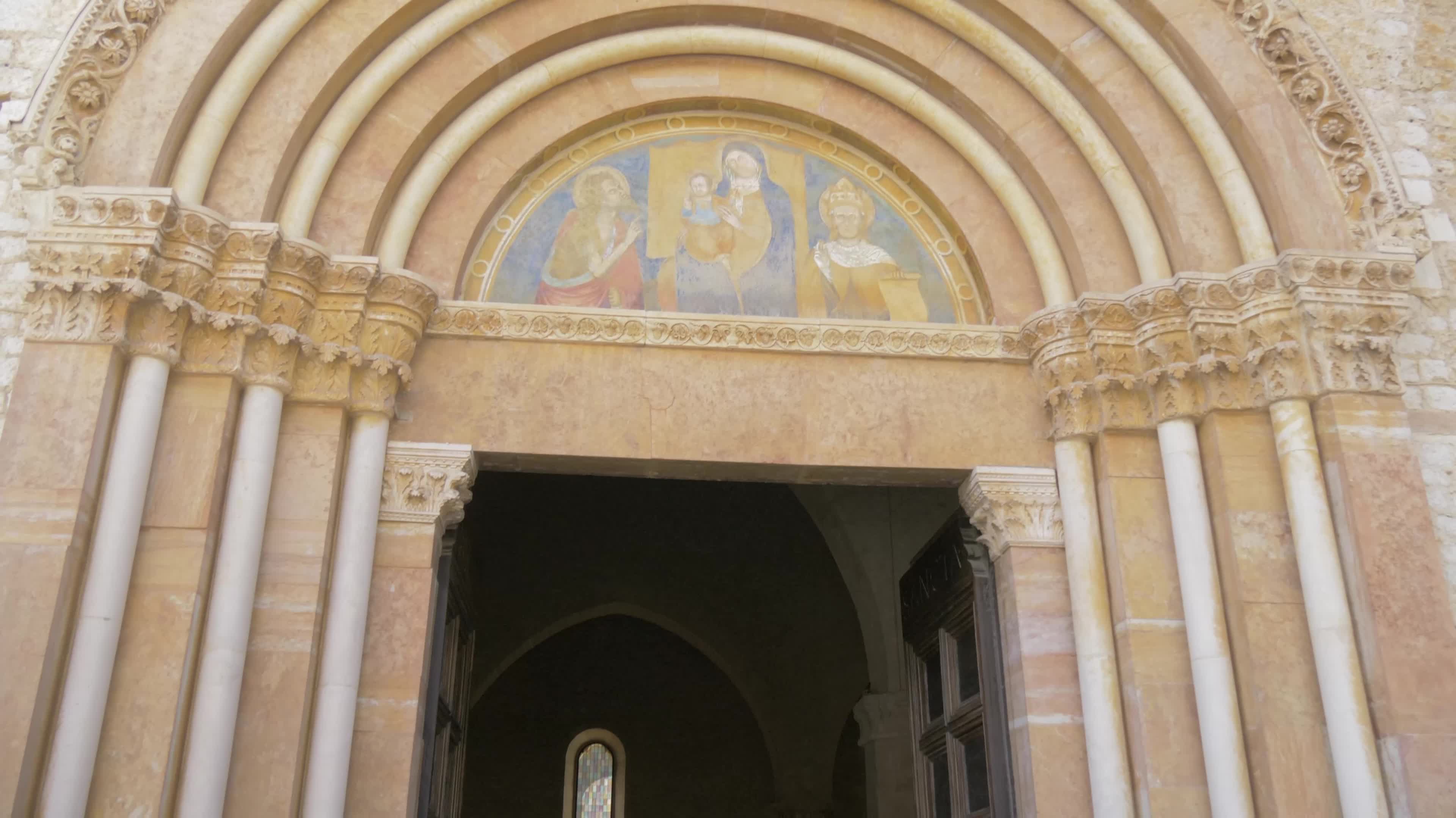 People Enter The Holy Door In L'Aquila, Italy