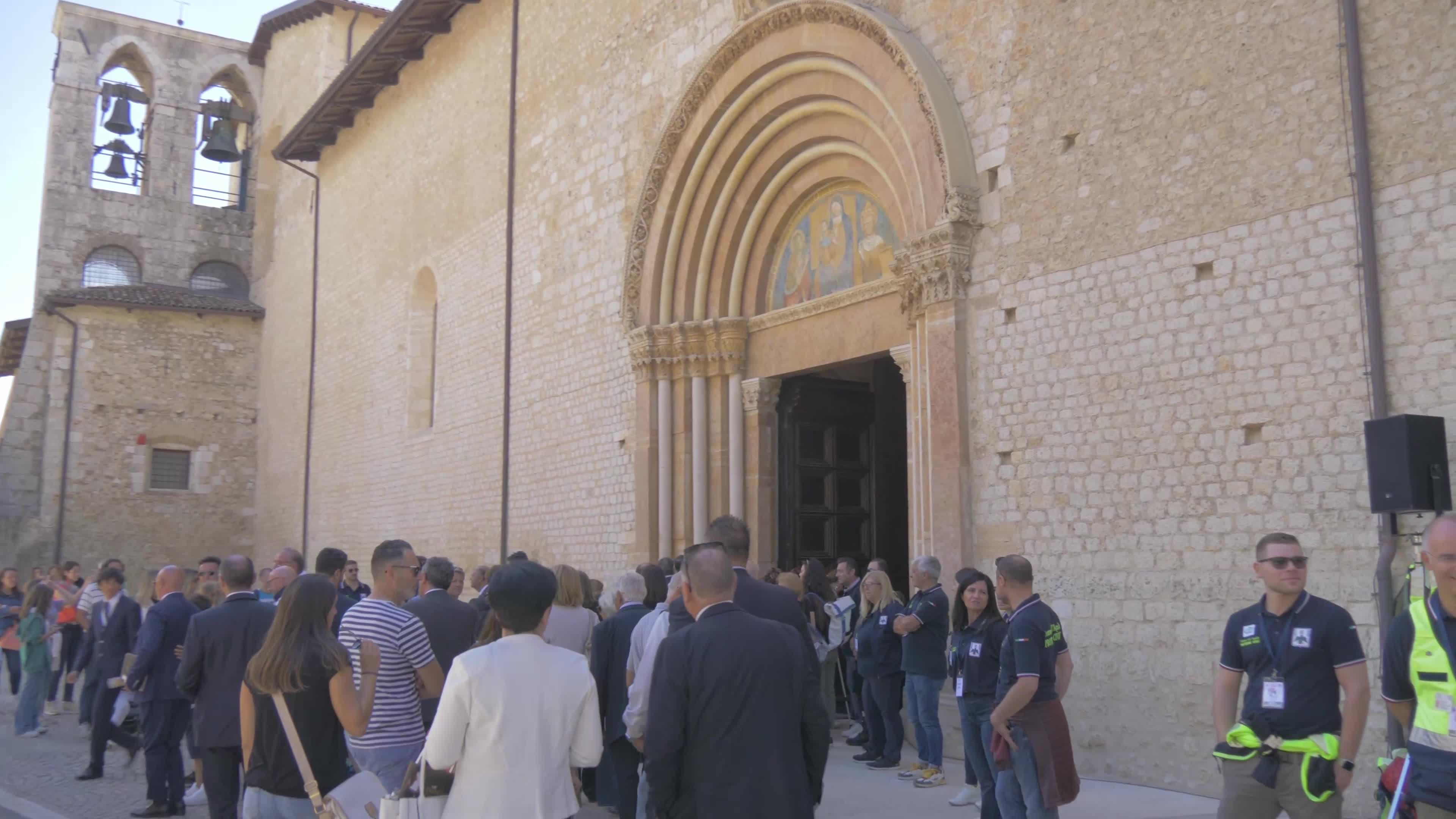 People Enter The Holy Door In L'Aquila, Italy