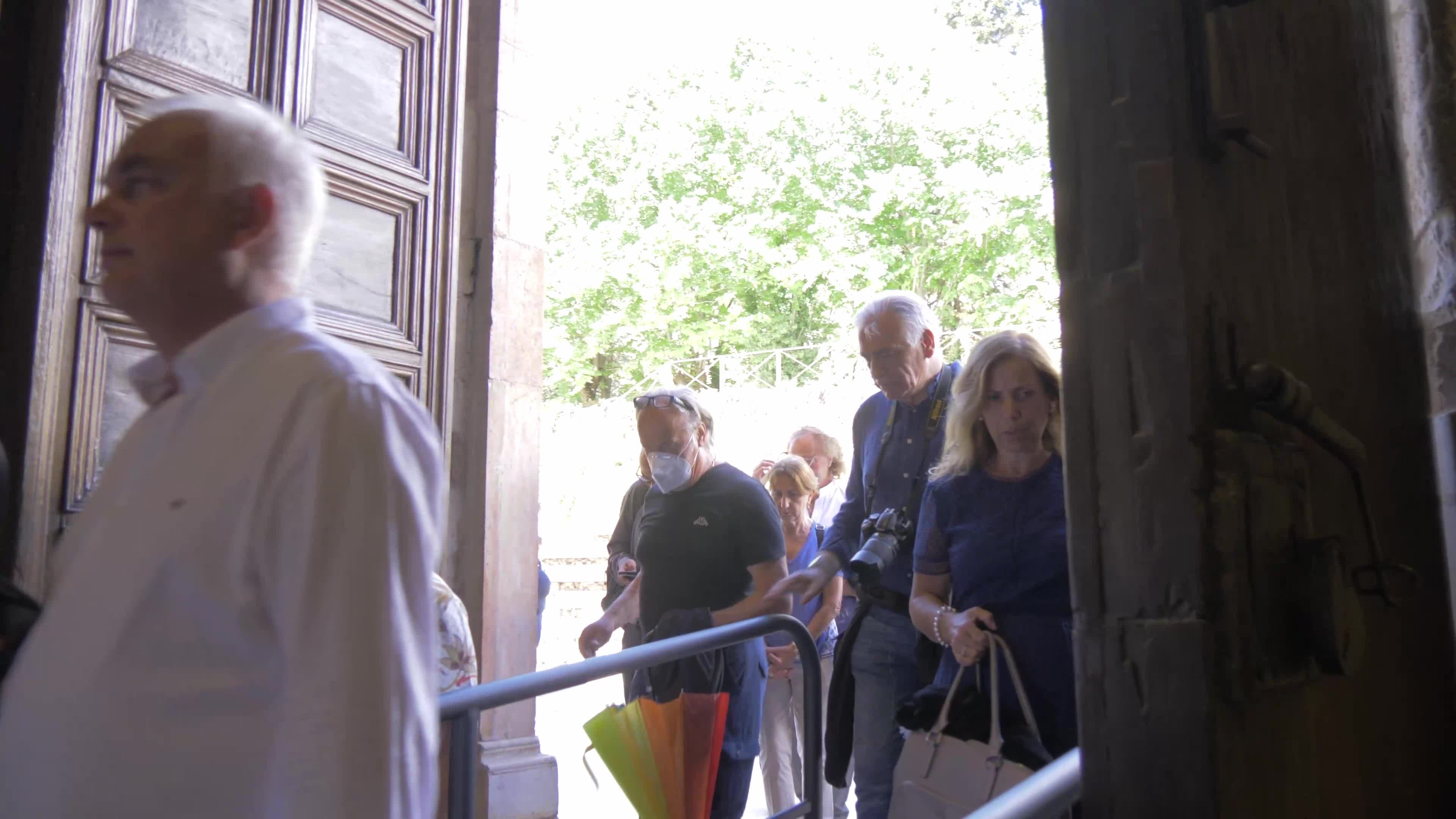 People Enter The Holy Door In L'Aquila, Italy