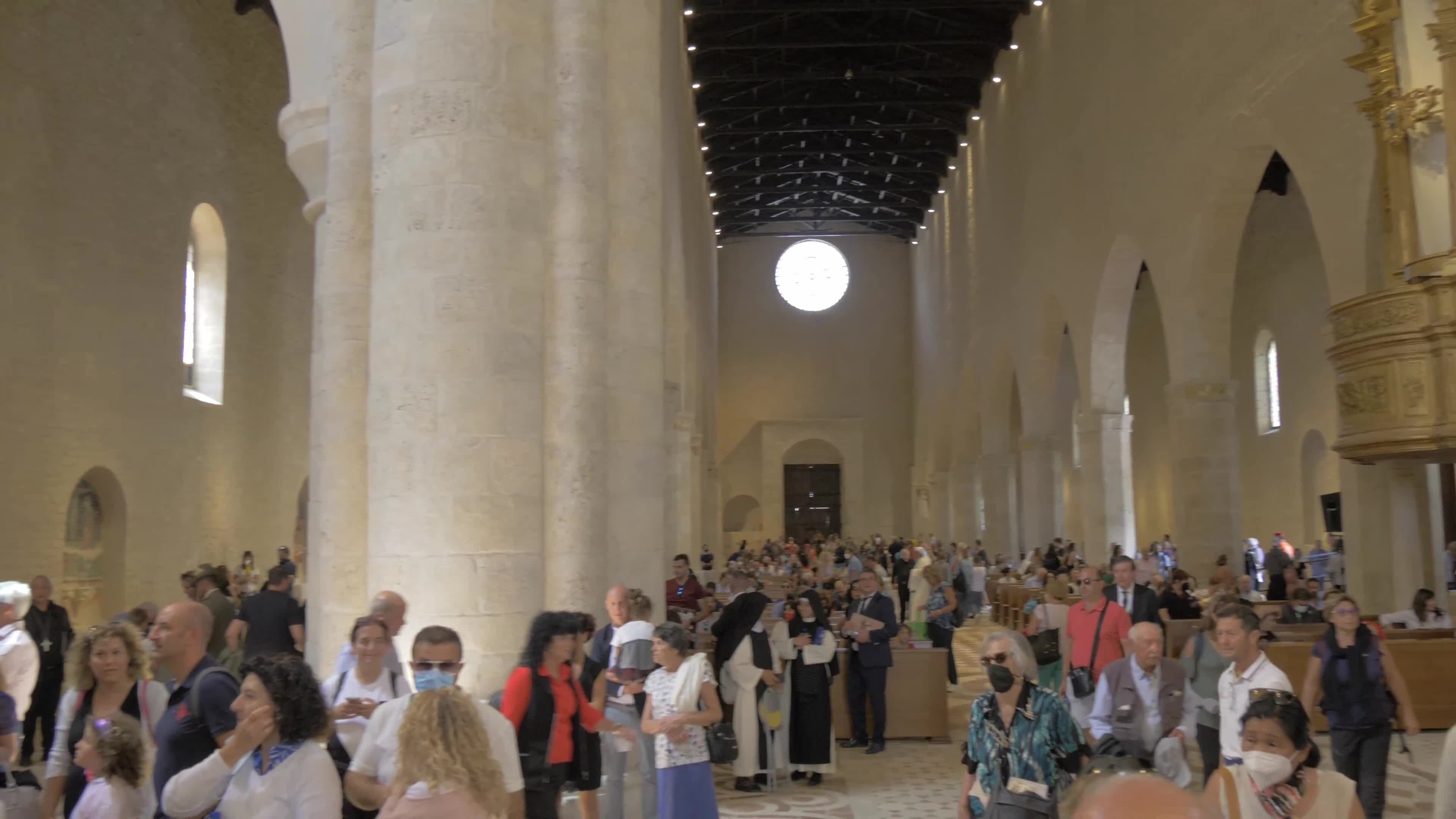 People Enter The Holy Door In L'Aquila, Italy