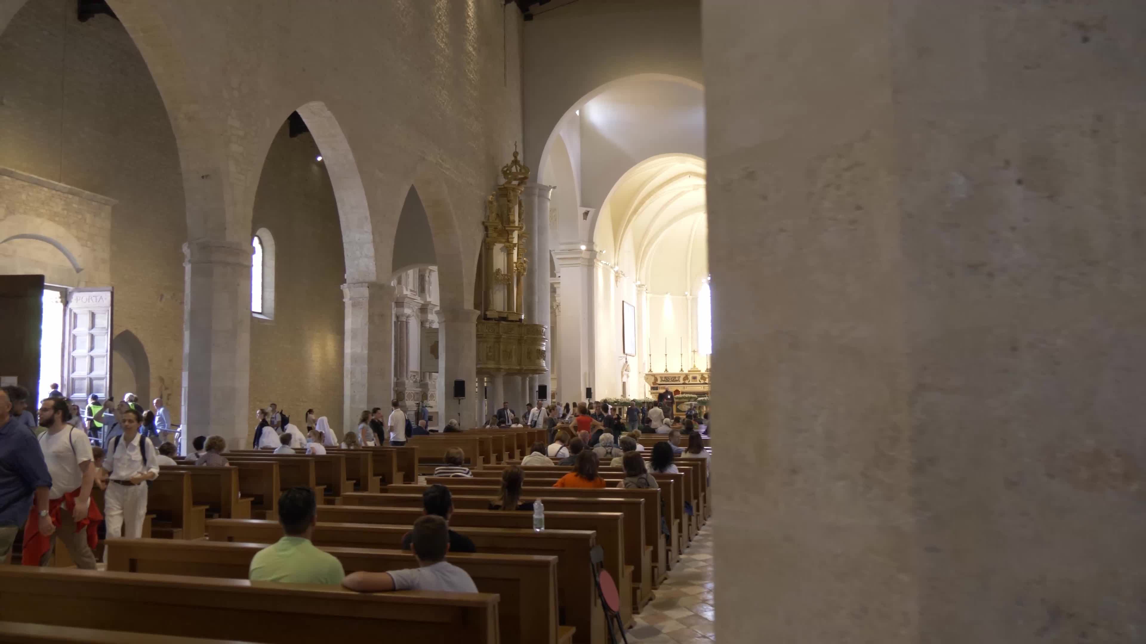 People Enter The Holy Door In L'Aquila, Italy