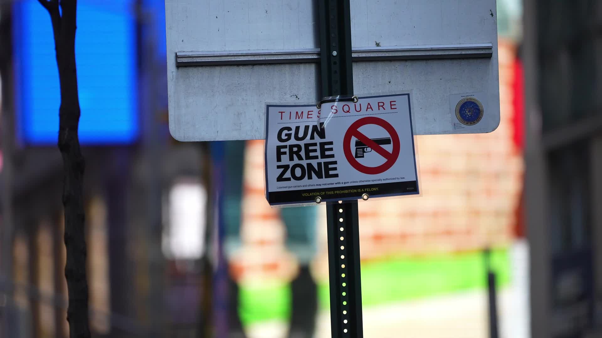Gun Free Zone Signs Posted Around Times Square As New State Law To Take Effect Thursday