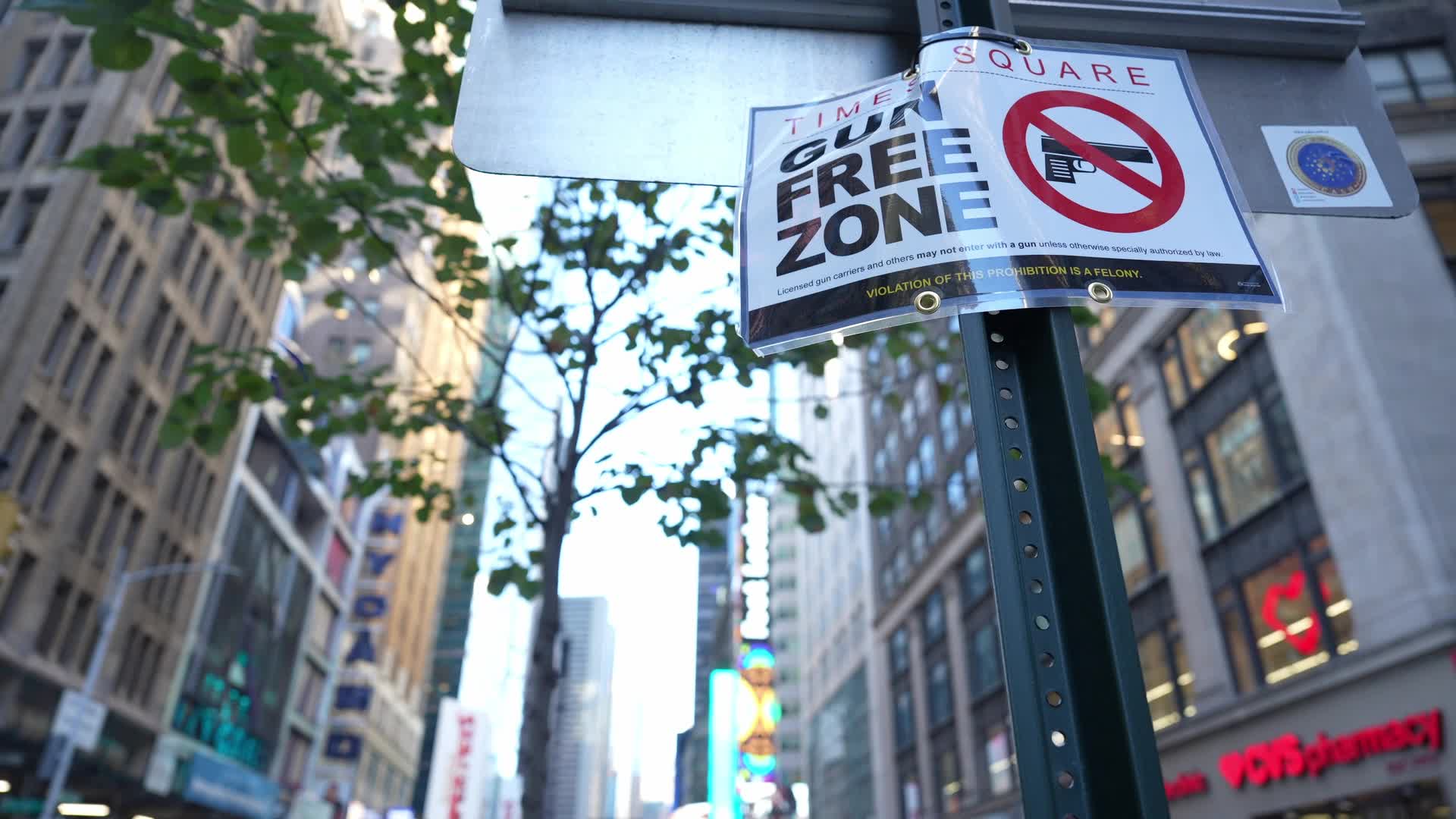 Gun Free Zone Signs Posted Around Times Square As New State Law To Take Effect Thursday