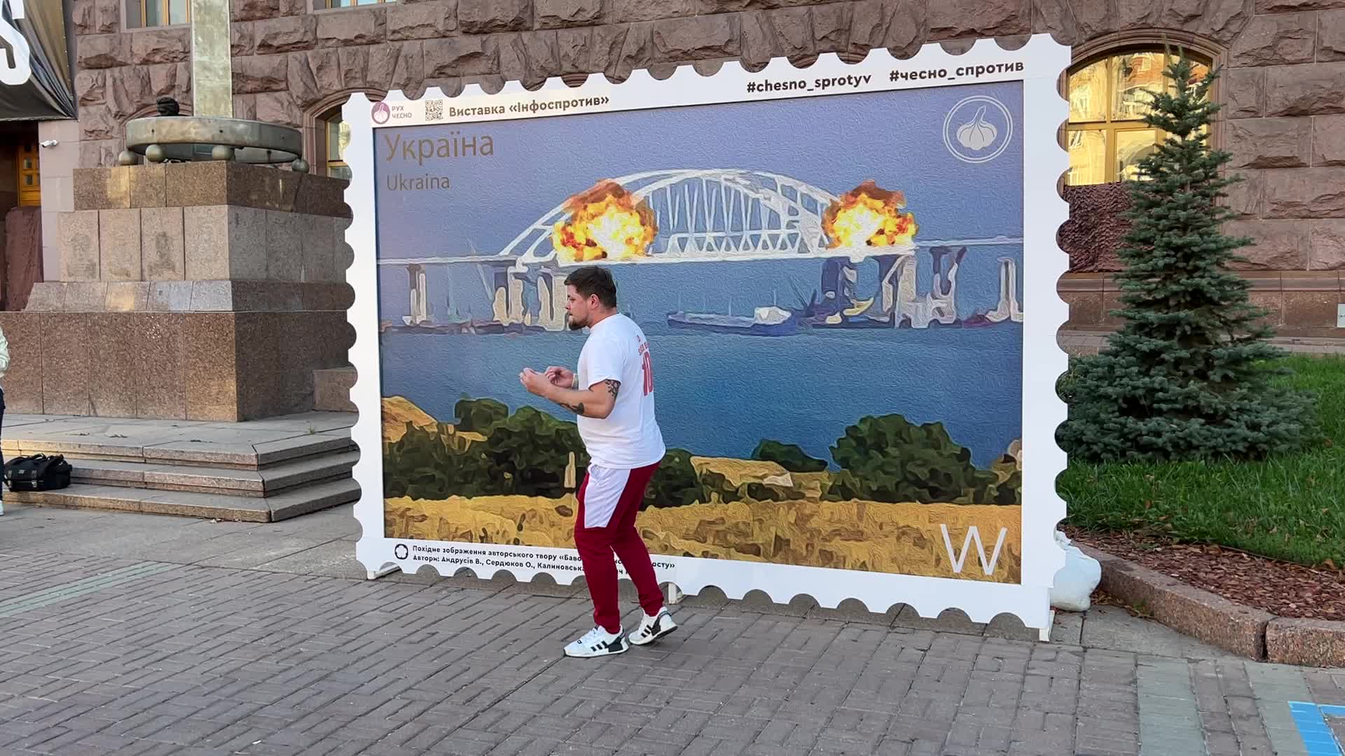 Artwork depicting Kerch bridge on fire in Kyiv, Ukraine