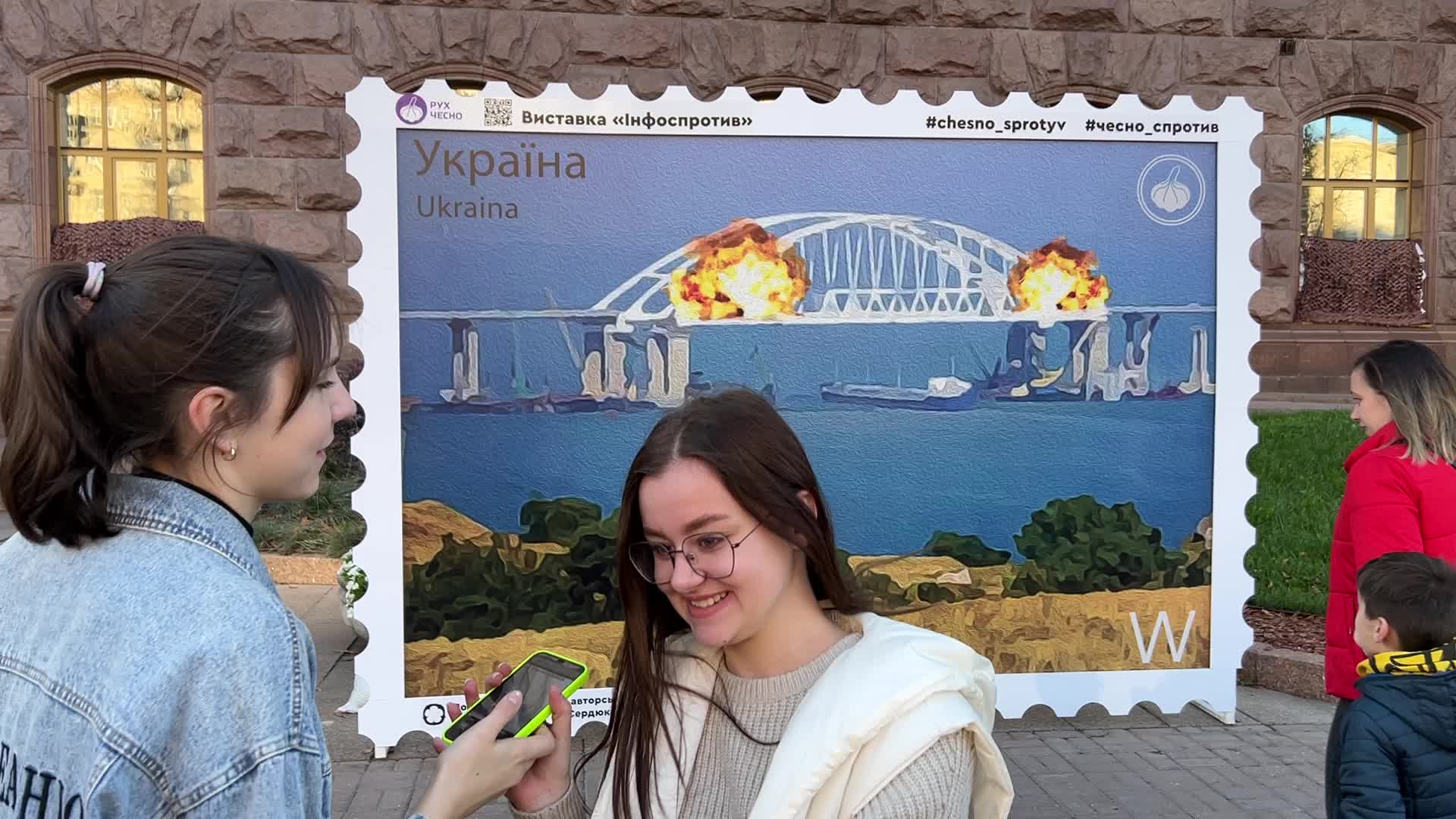 Artwork depicting Kerch bridge on fire in Kyiv, Ukraine